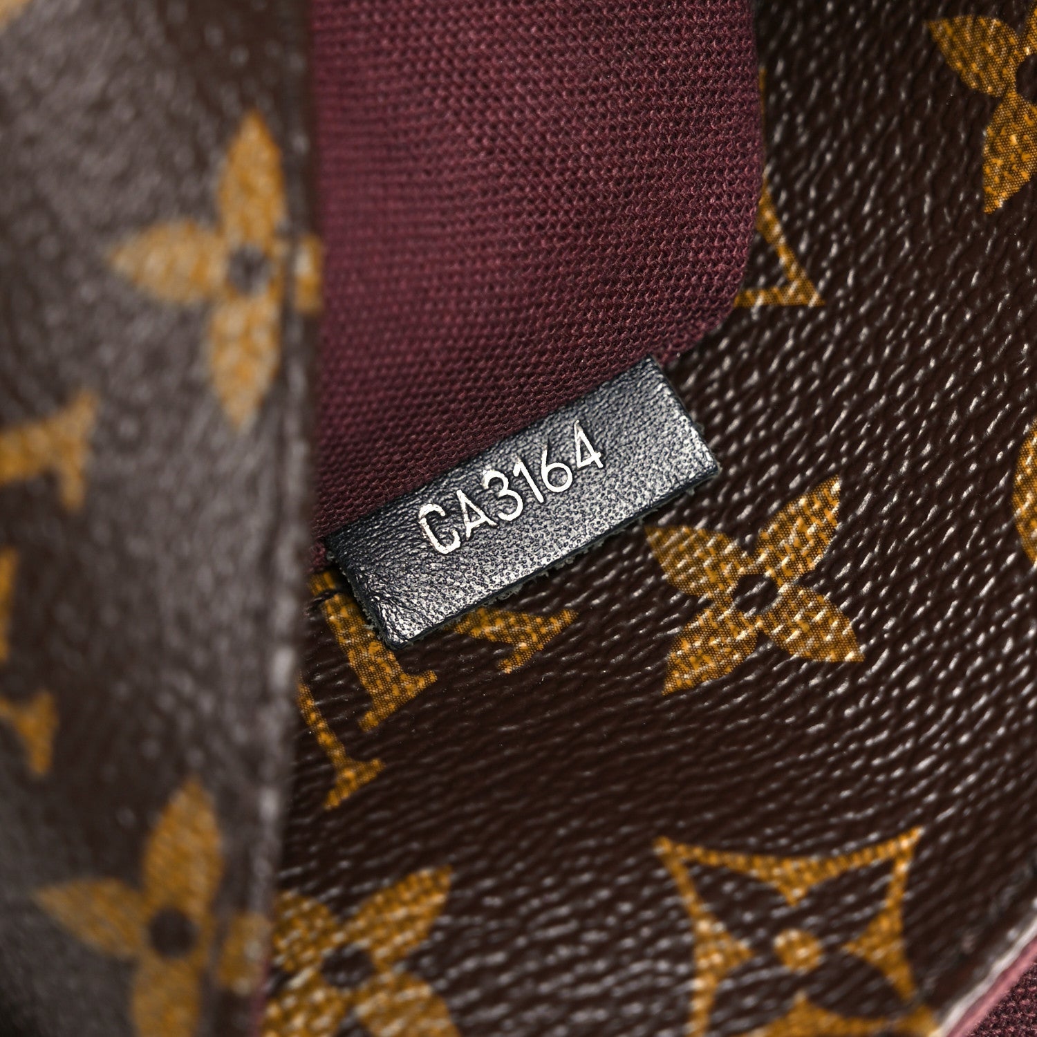 Monogram Macassar District PM