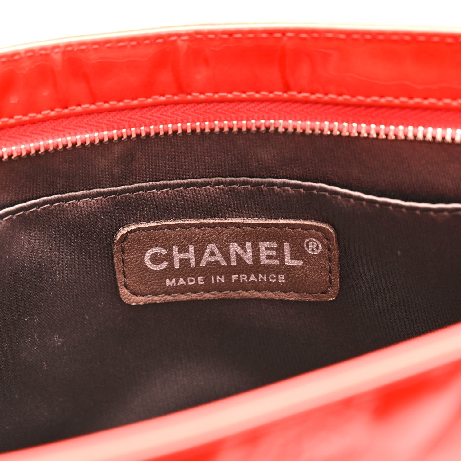 Patent Calfskin Lucky Symbols Pochette Coral