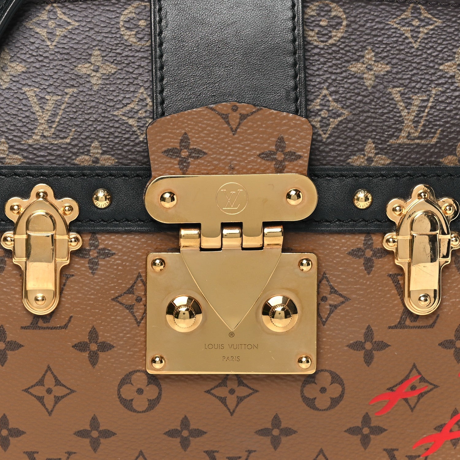 Reverse Monogram Trunk Clutch