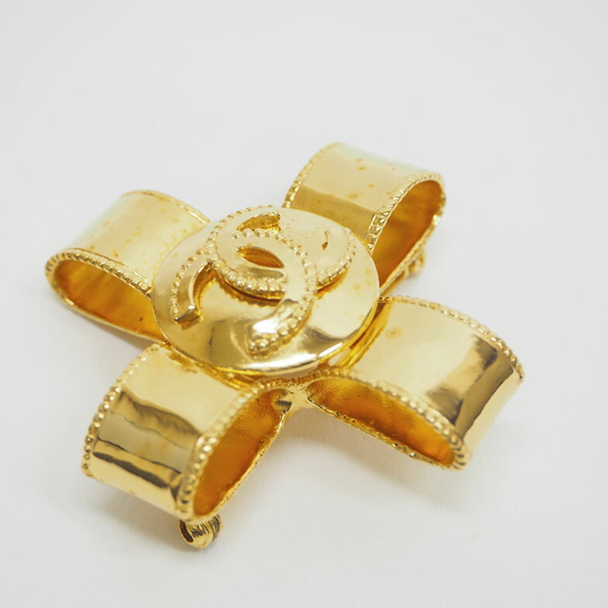 CC Logo Cross Brooch Gold-Tone Metal