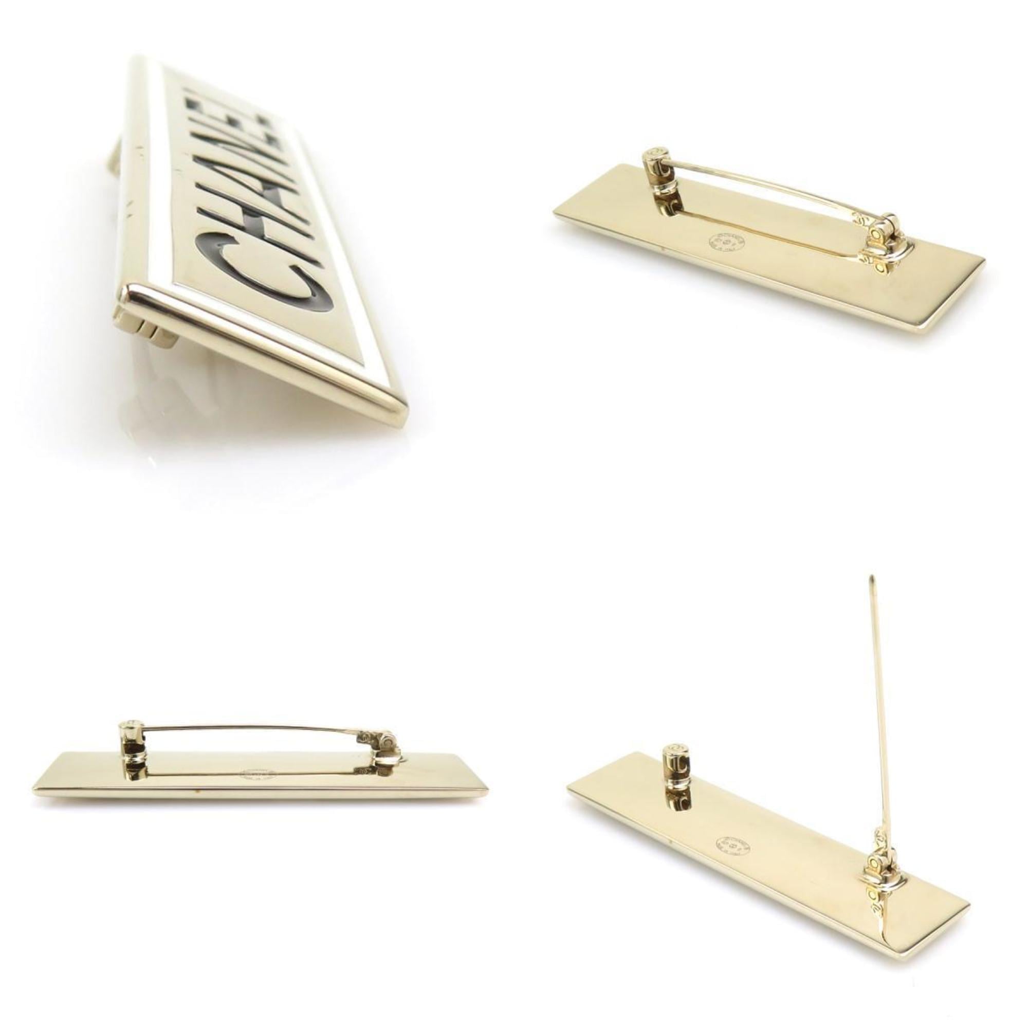 Brooch Enamel and Metal Black Gold White