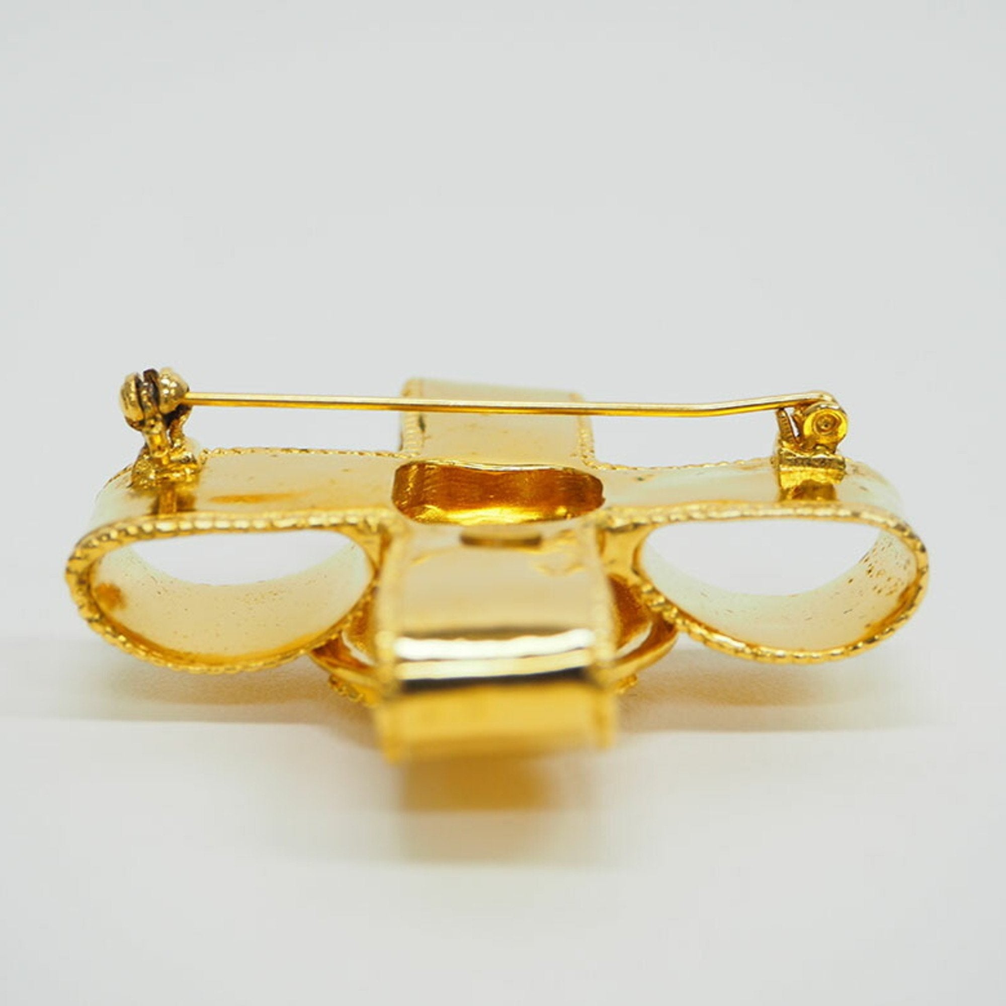 CC Logo Cross Brooch Gold-Tone Metal
