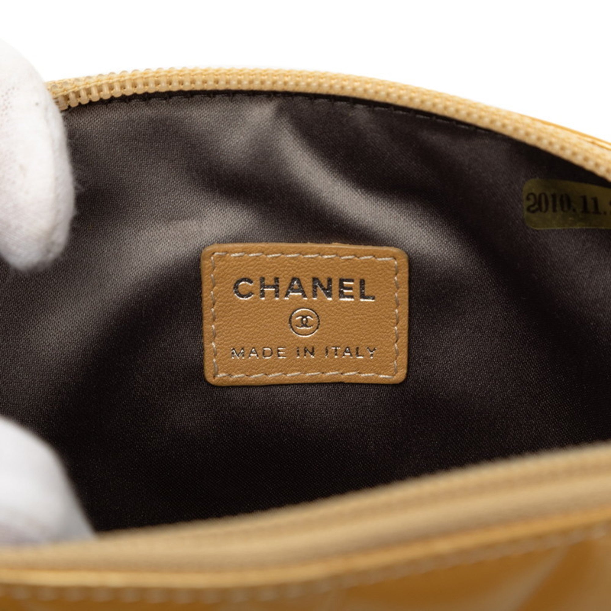 Lucky Symbols Pochette Embossed Quilted Patent