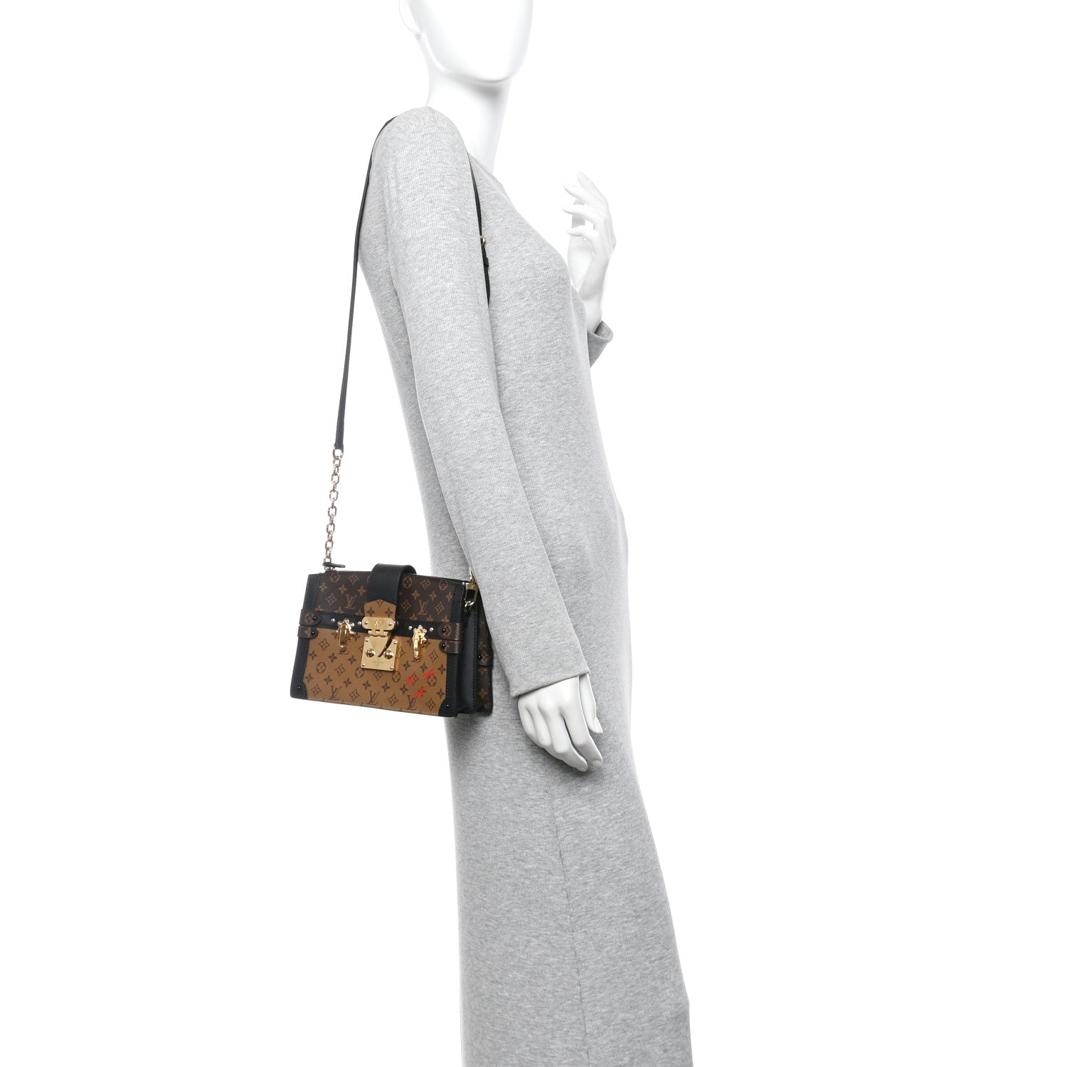 Reverse Monogram Trunk Clutch