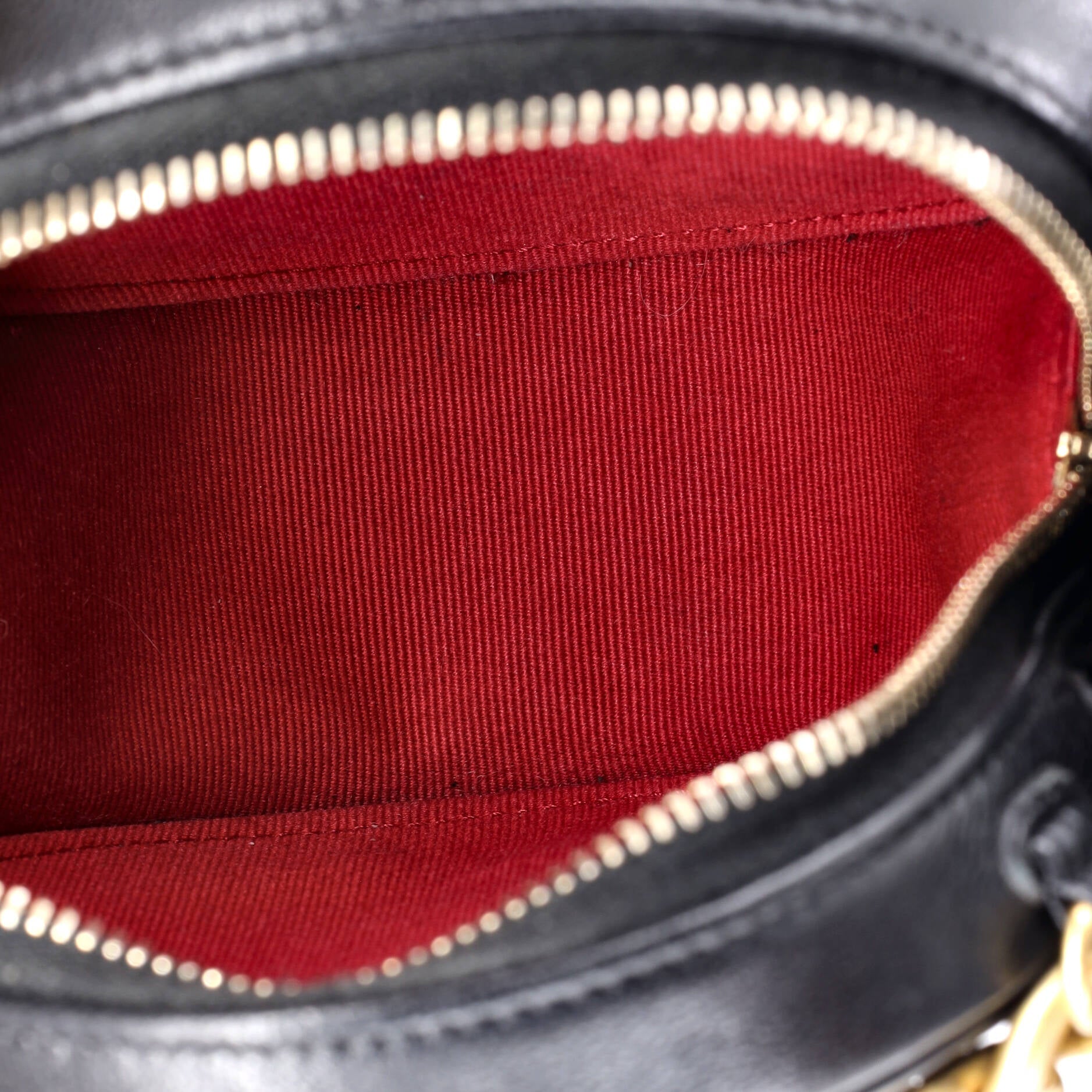 19 Round Clutch with Chain Quilted Leather
