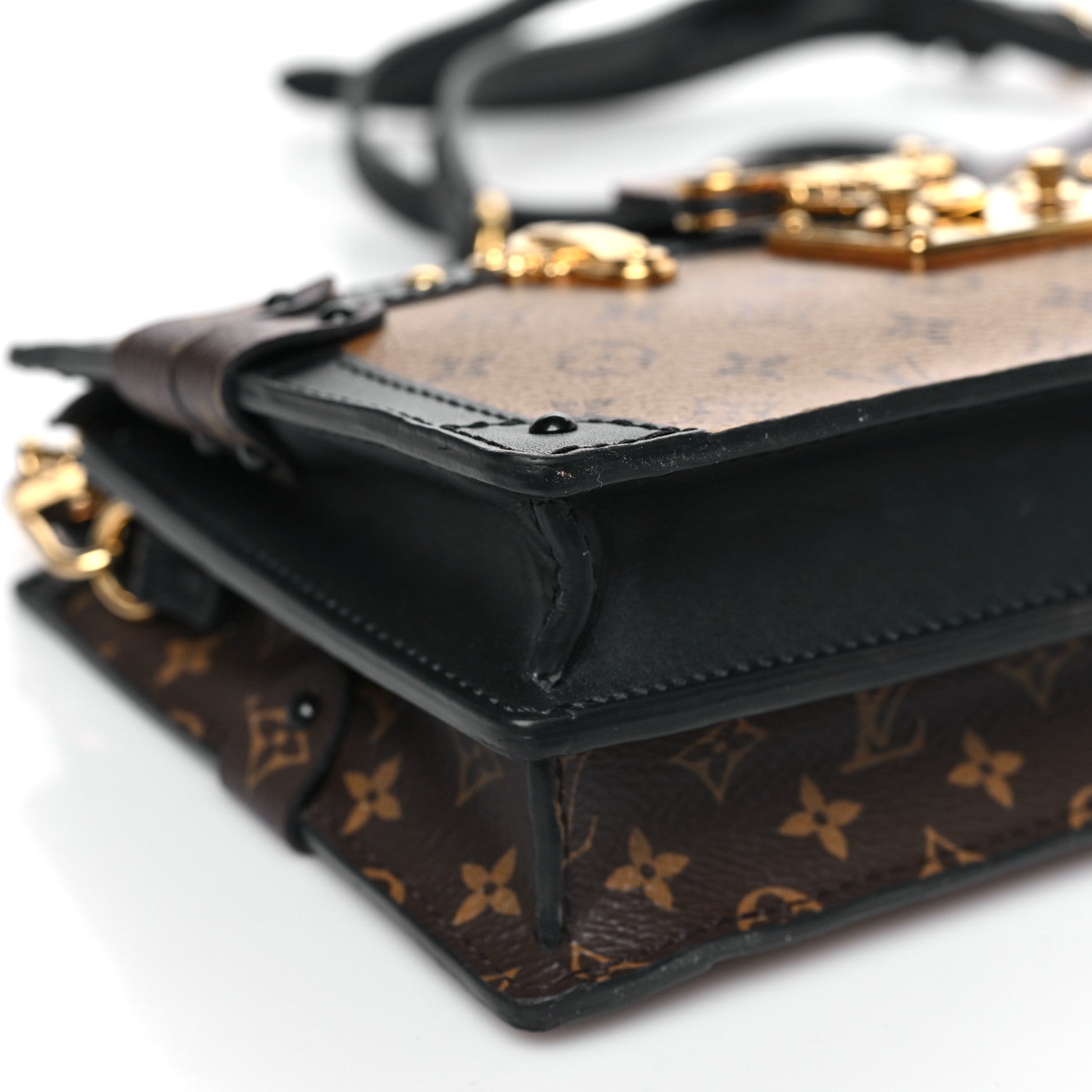 Reverse Monogram Trunk Clutch