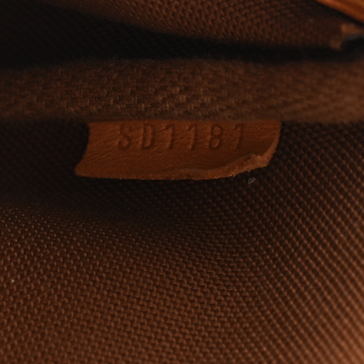 Monogram Eva Clutch
