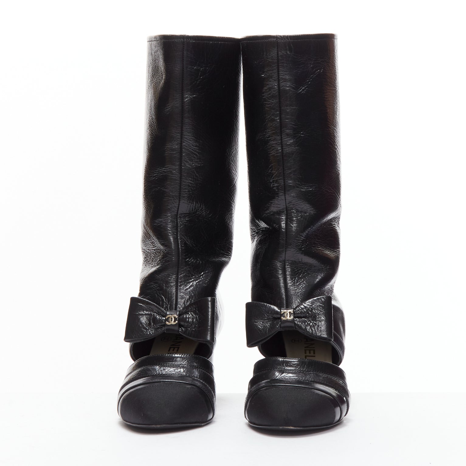 Women's Chanel silver CC bow leather cut out boots