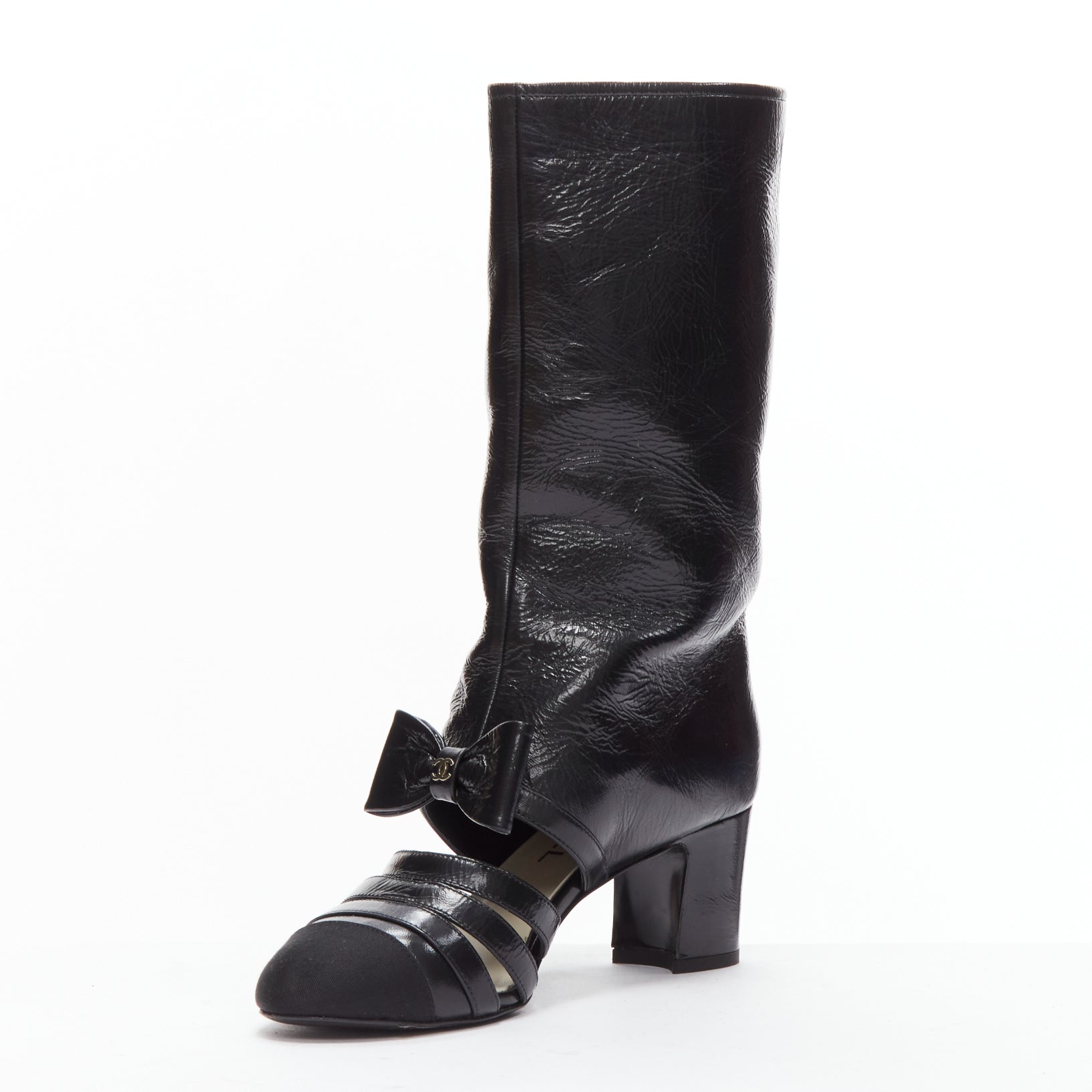Women's Chanel silver CC bow leather cut out boots