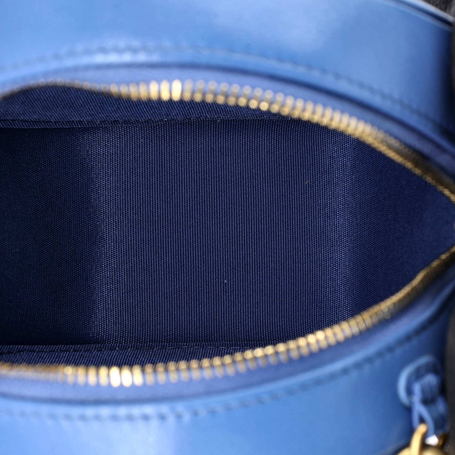 19 Round Clutch with Chain Quilted Leather