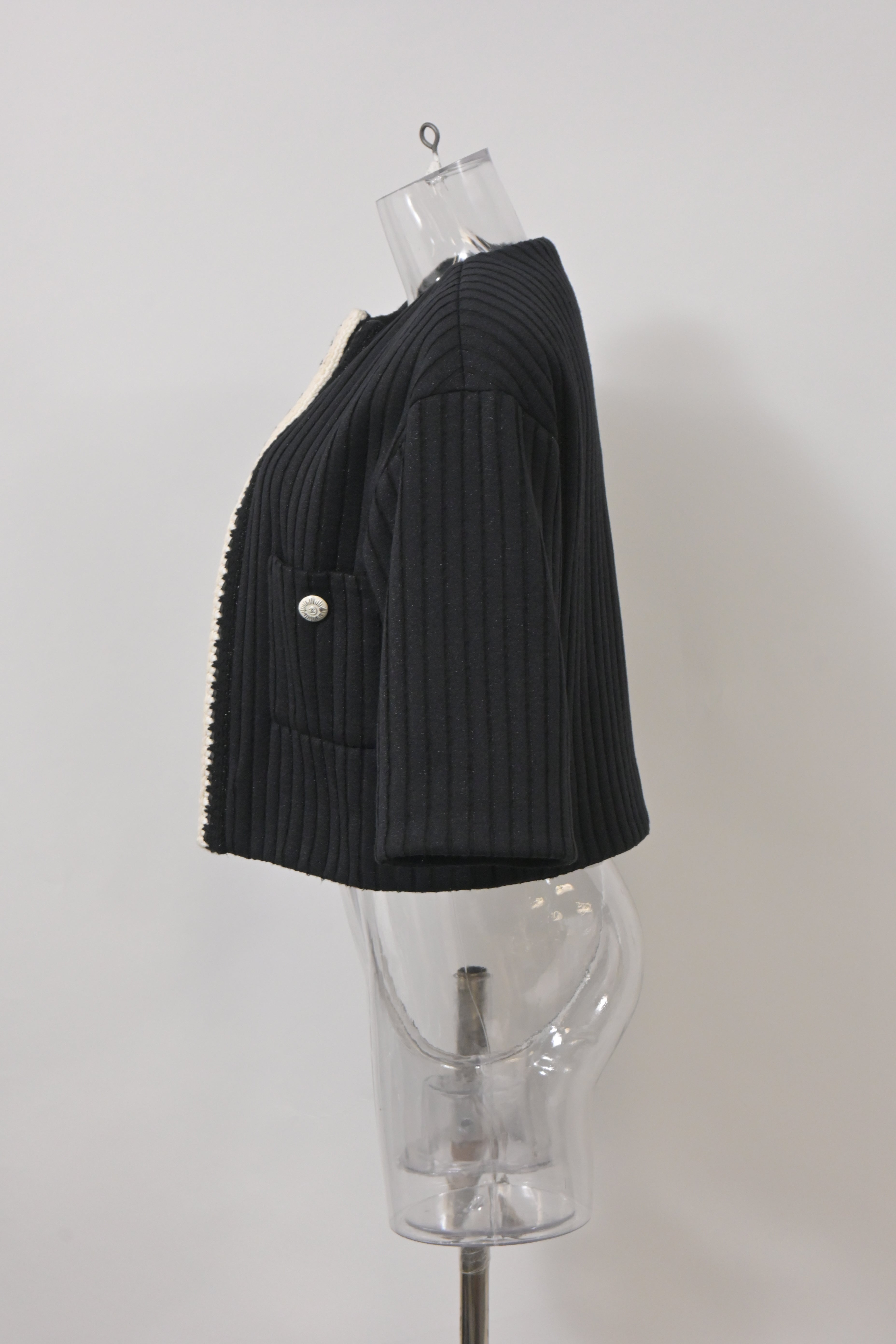 Women's Chanel Cruise 2022 Knitted Collarless Jacket with Pockets in Black Polyamide