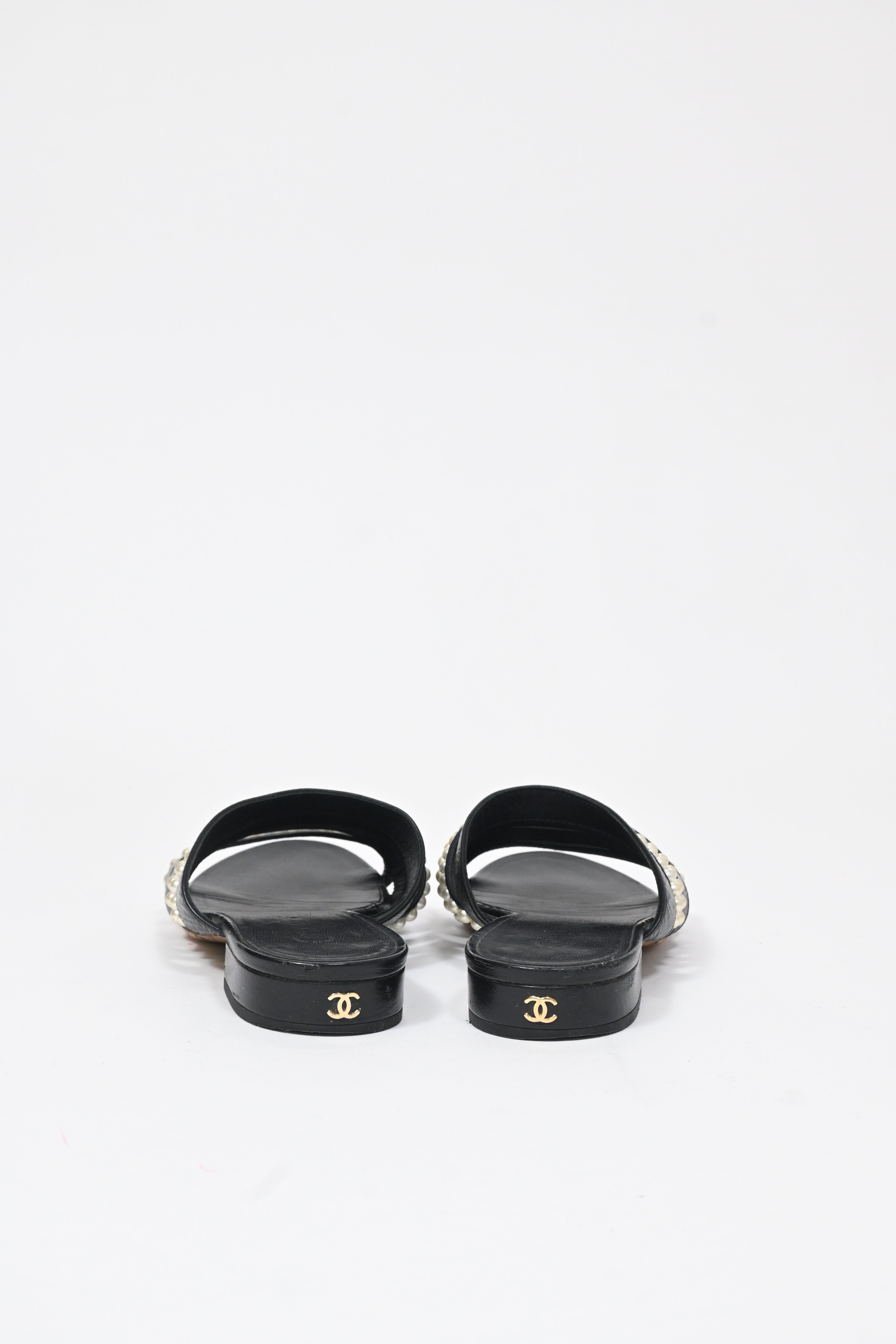 Women's  Chanel CC Pearl-Embellished Slip-On Flats in Black Leather