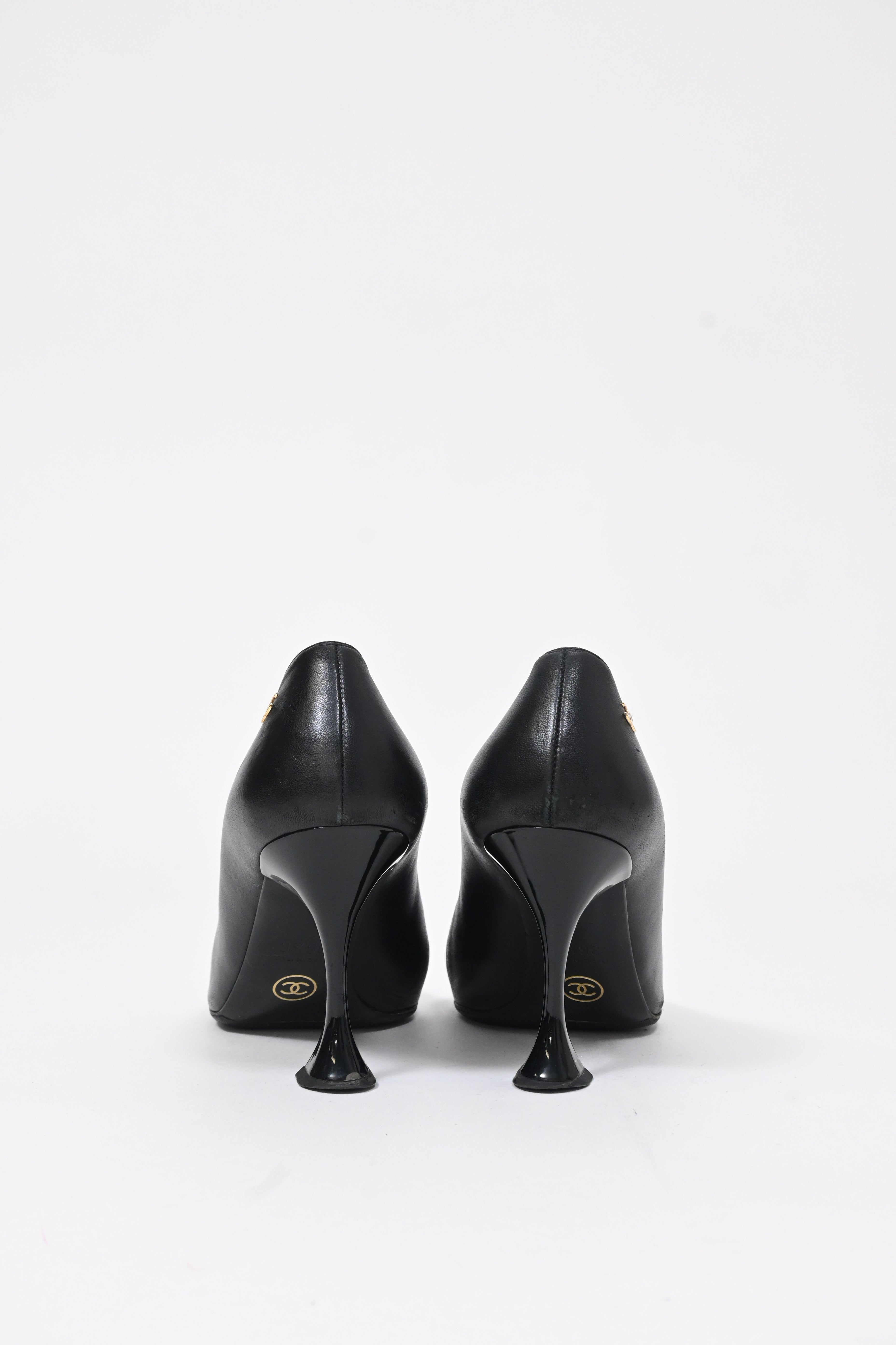 Women's Chanel Interlocking CC Sculptured Heel Pumps in Black Leather