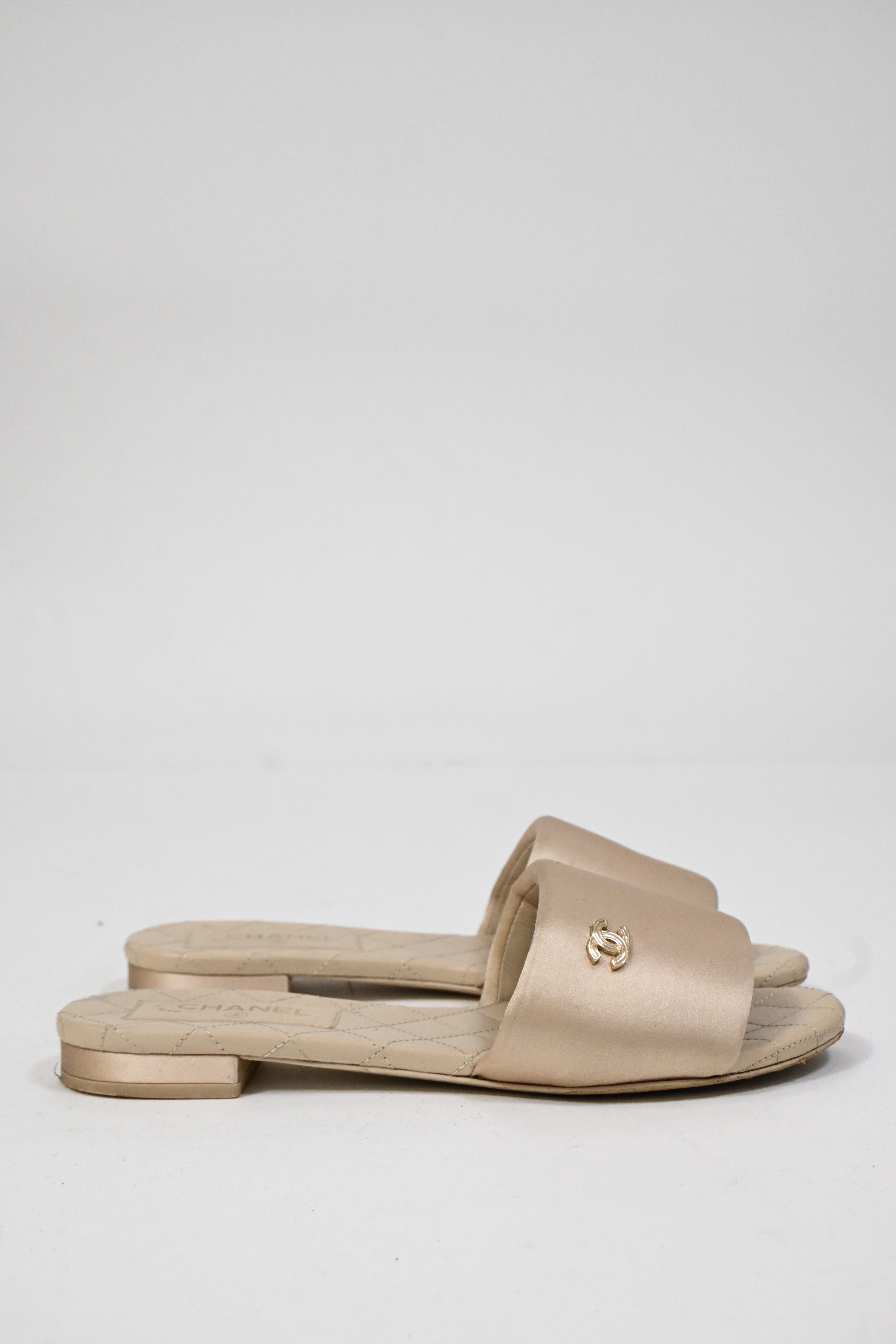 Women's Chanel CC Quilted Slide Flats in Beige Satin