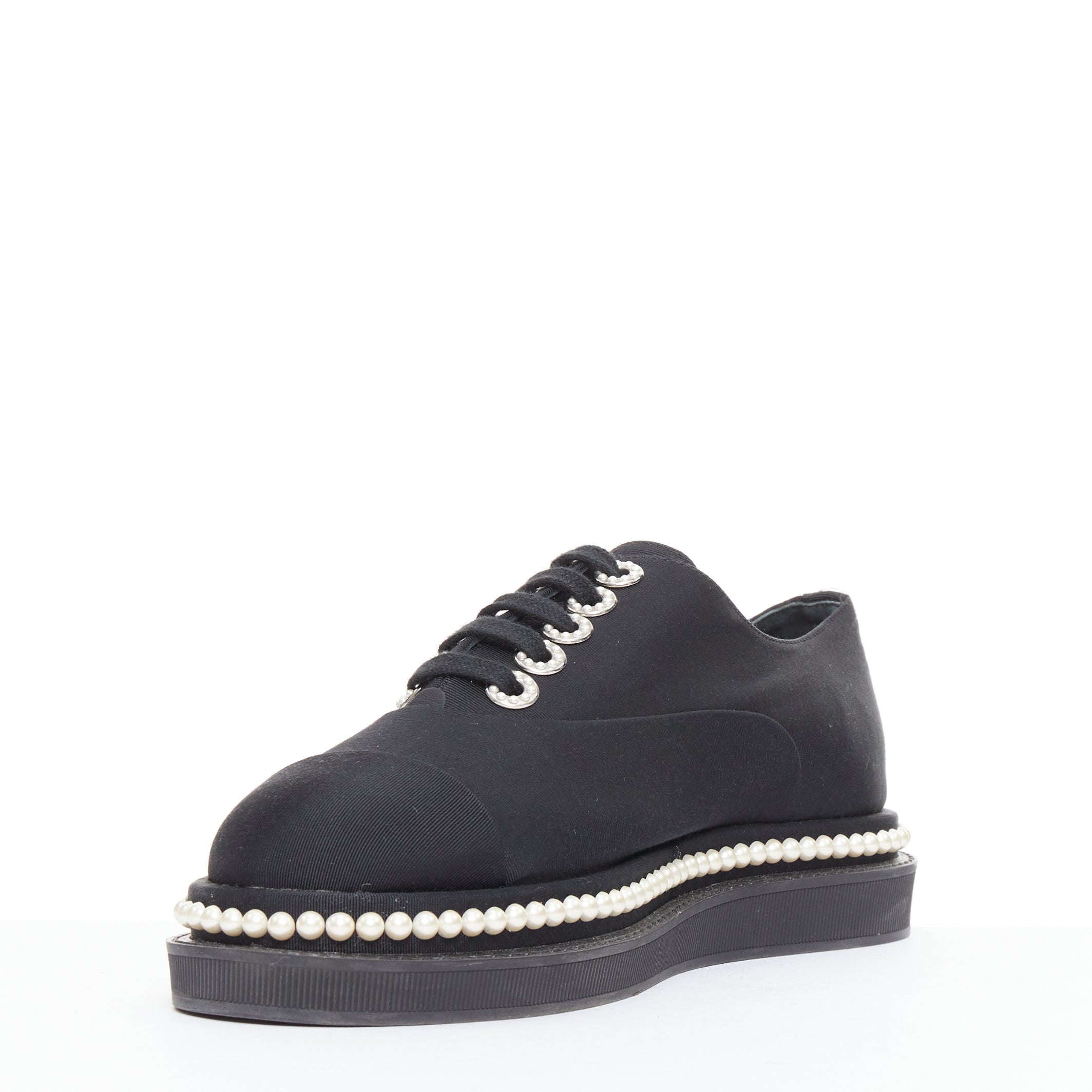 Women's Chanel black canvas pearl oxfords