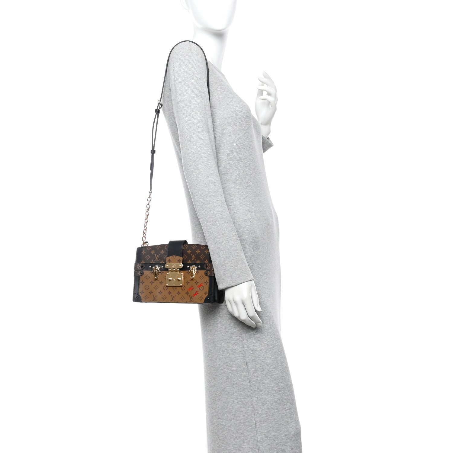 Reverse Monogram Trunk Clutch