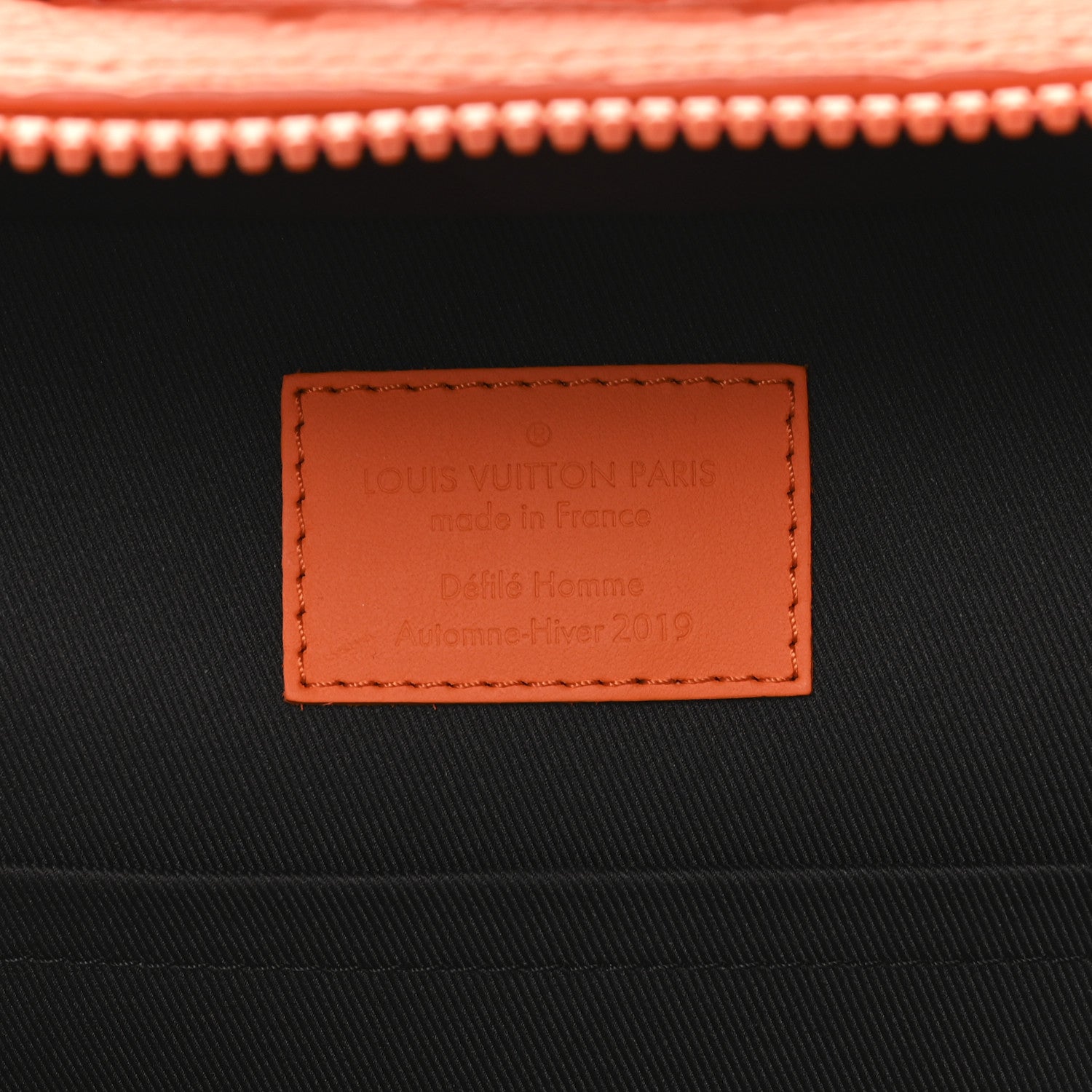 Taurillon Empreinte Soft Trunk Backpack PM Orange