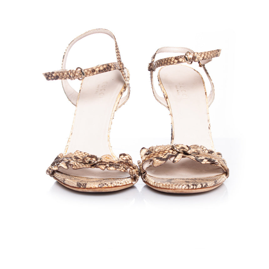 Women's Gucci Neutral colored python sandal.