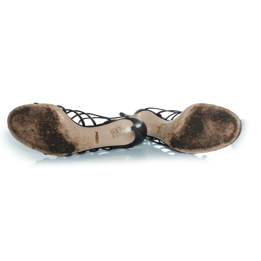 Women's Gucci black strap sandals with Gucci buttons