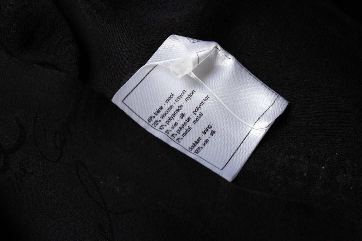 Women's Chanel black and gold tweed jacket