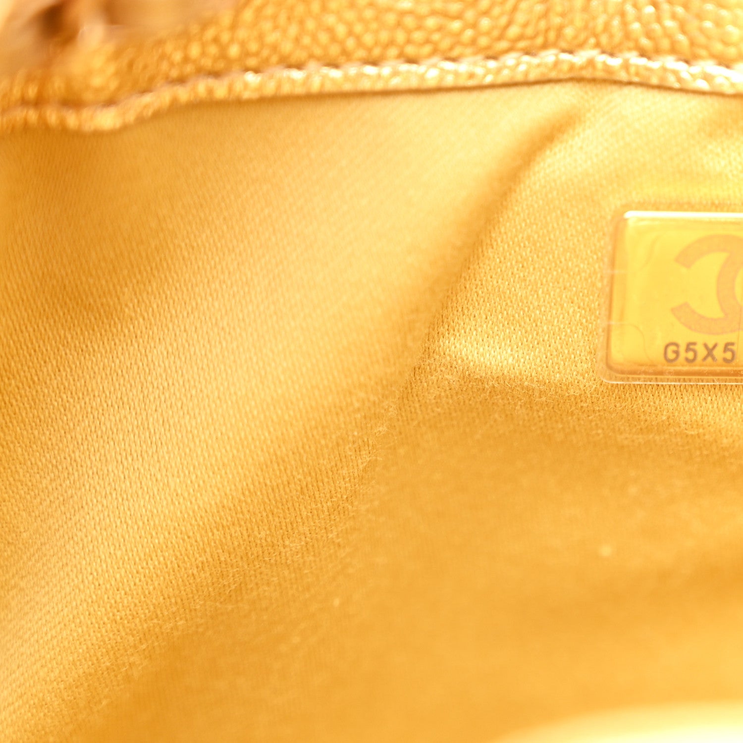 Metallic Caviar Quilted Mini Chanel 25 Handbag Gold