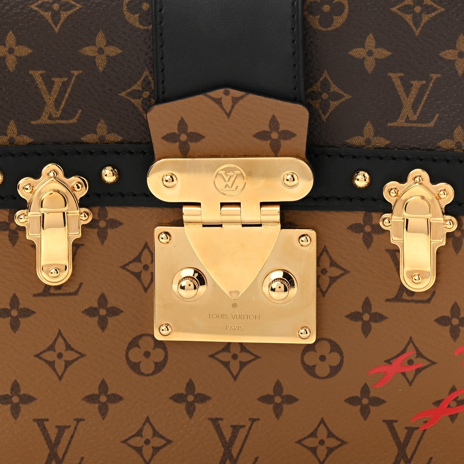 Reverse Monogram Trunk Clutch