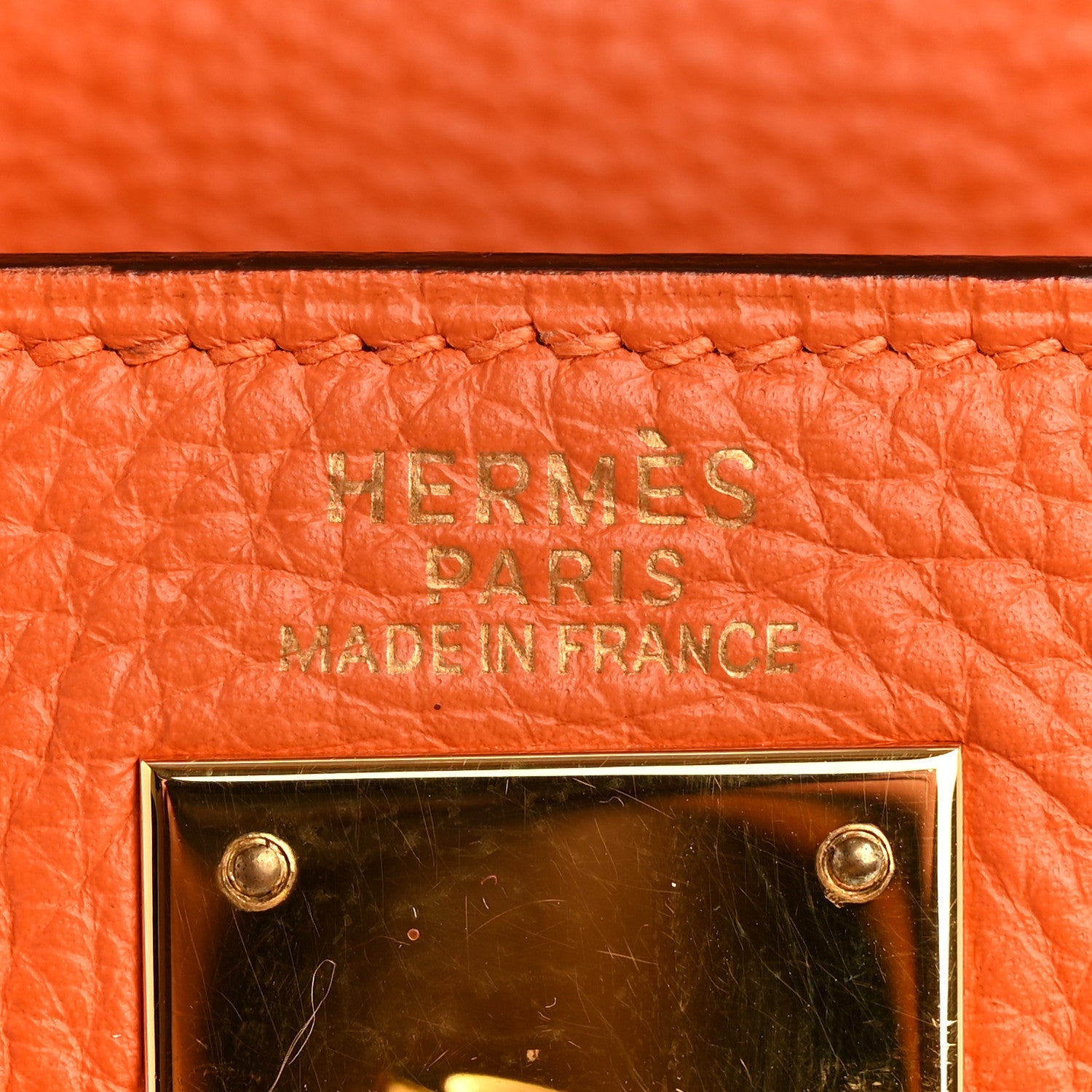Togo Kelly Retourne 32 Orange