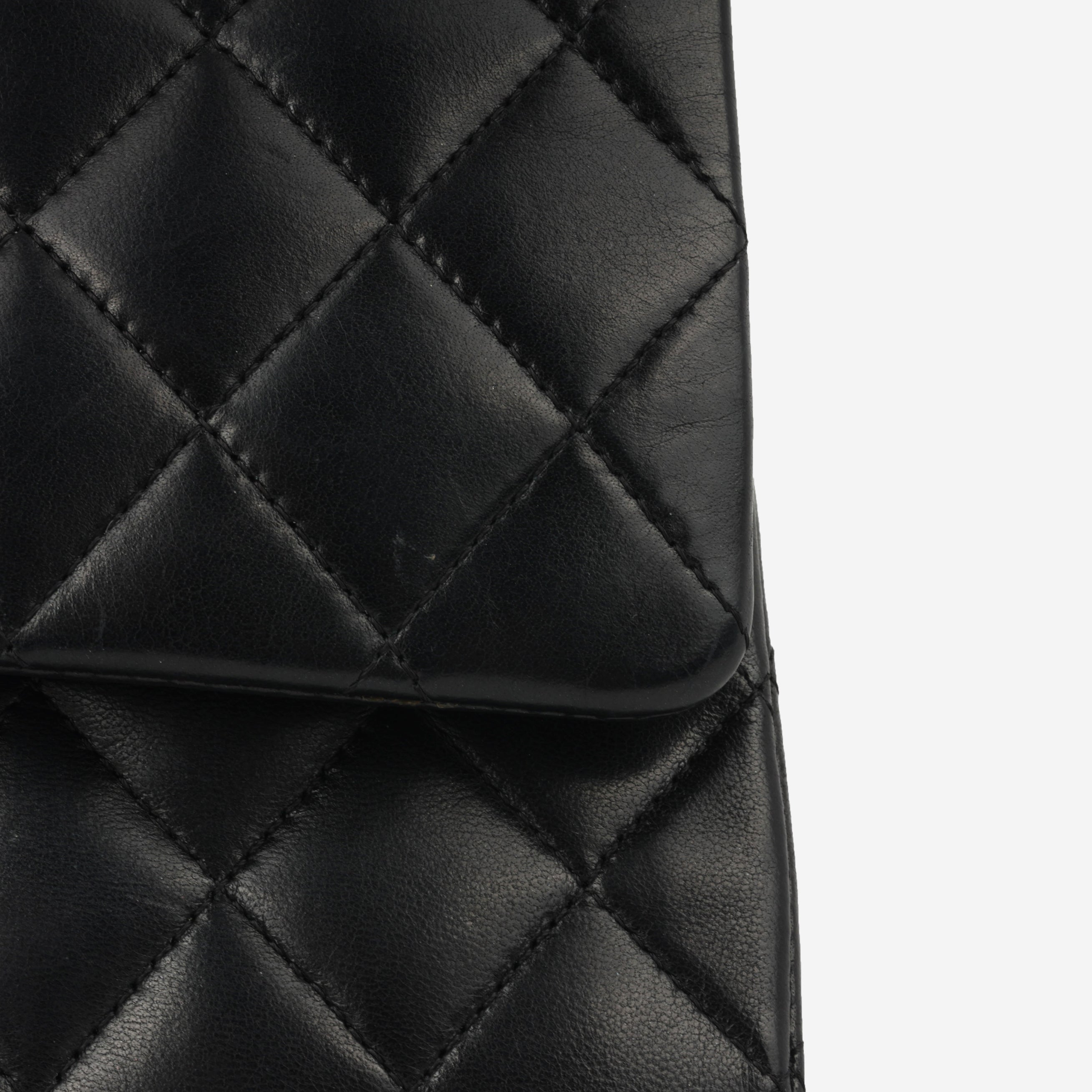 Chanel Medium Classic Flap - Black Lambskin | Silver Hardware