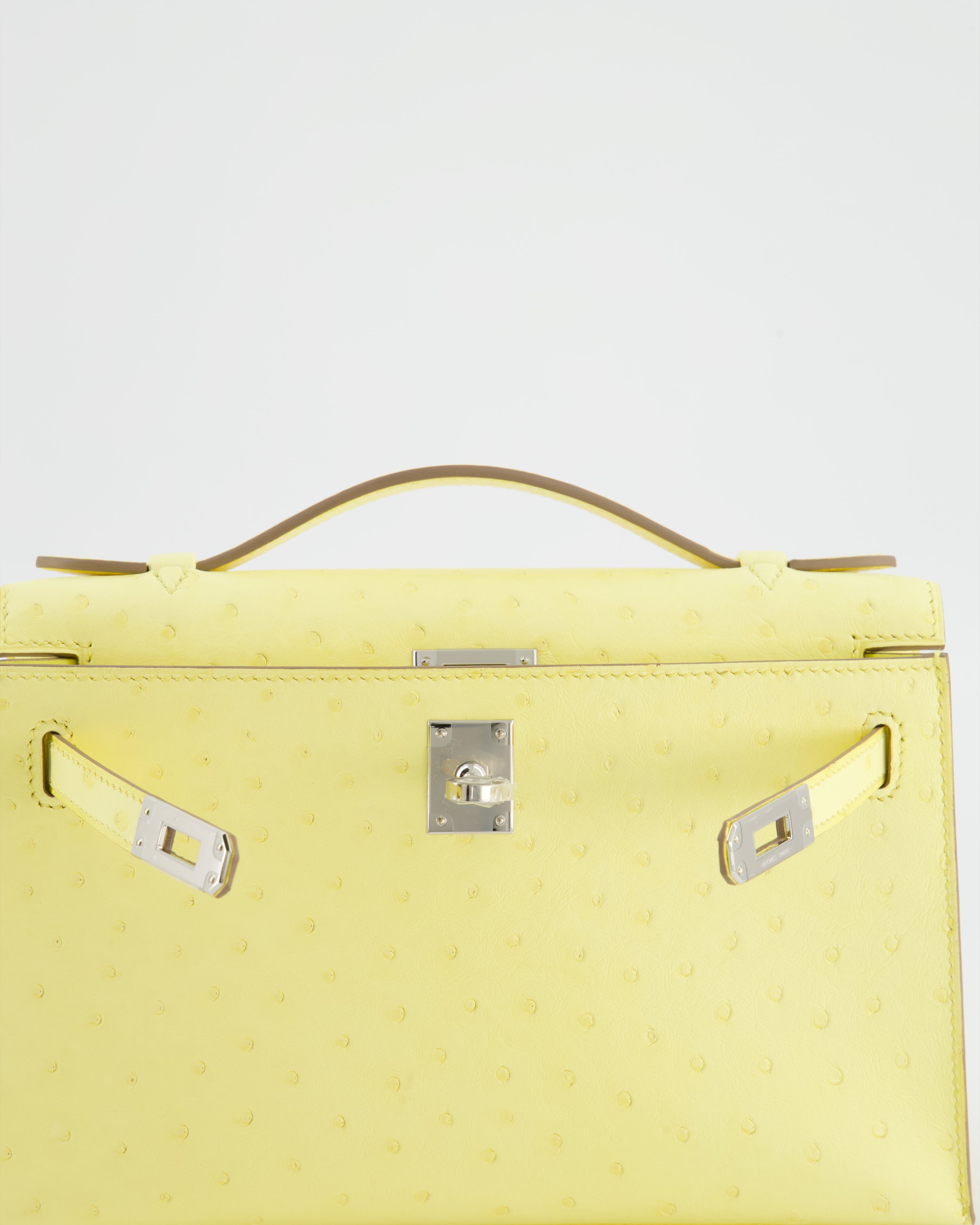 Hermès Kelly Pochette Bag in Limoncello Ostrich Leather with Palladium Hardware