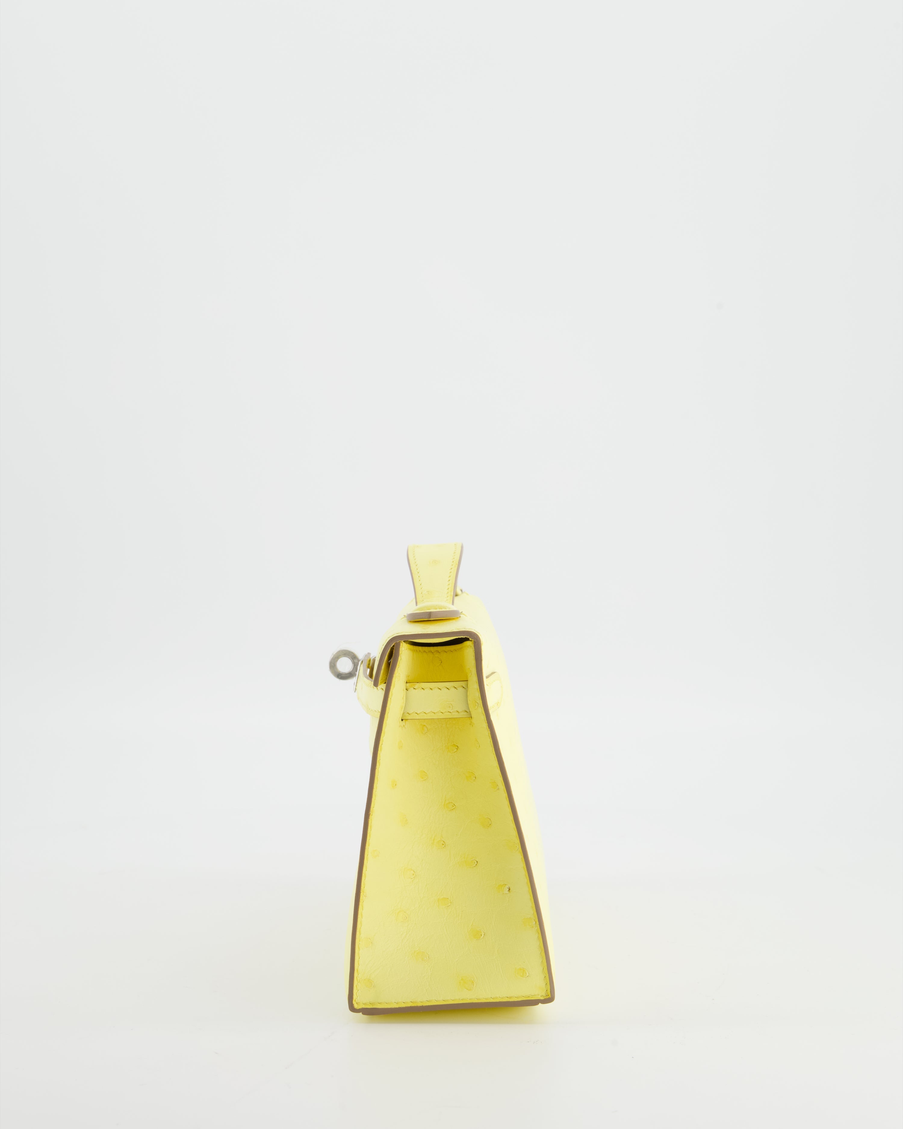 Hermès Kelly Pochette Bag in Limoncello Ostrich Leather with Palladium Hardware