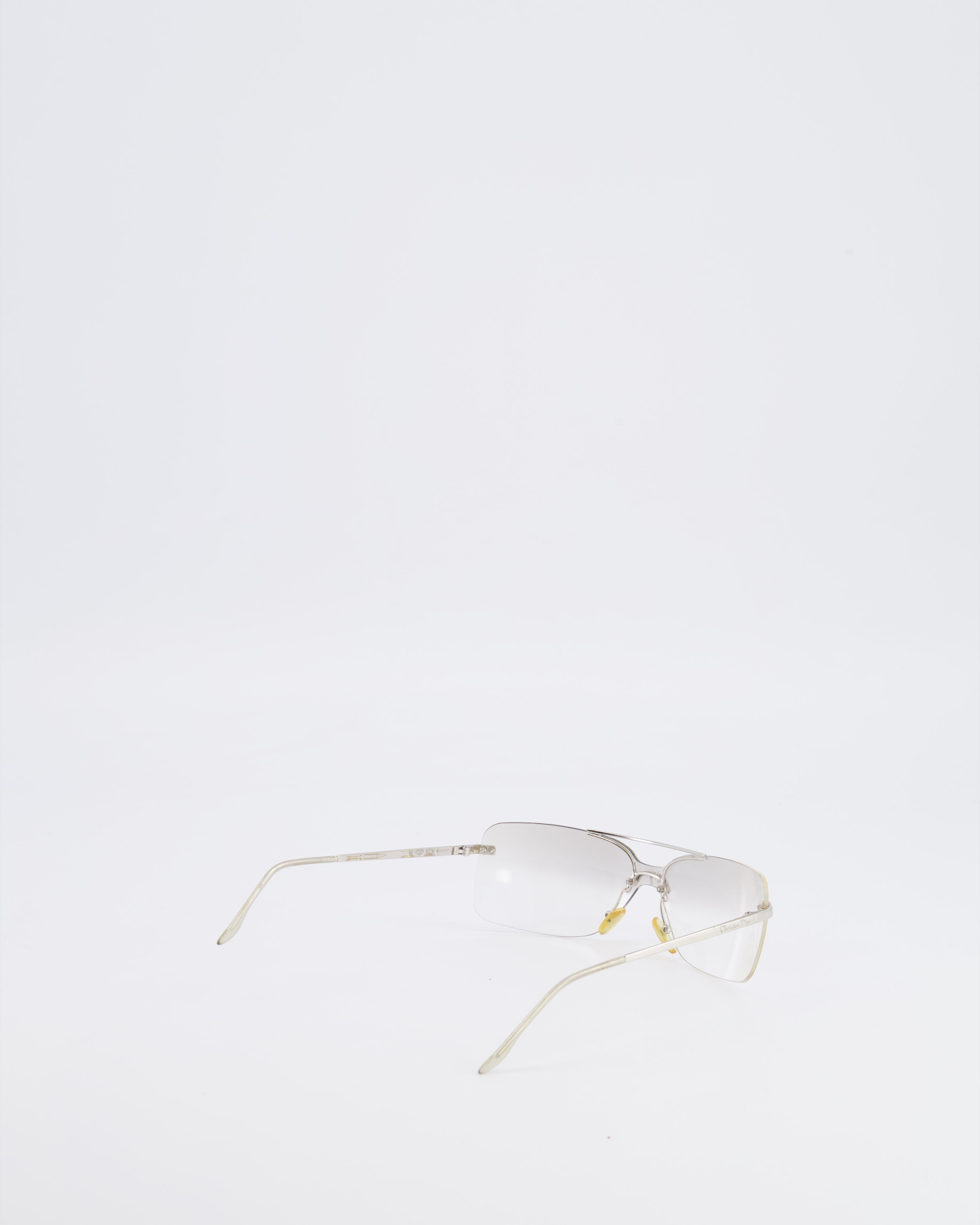 Christian Dior Vintage Transparent Rimless Shield-Lens Mini Motard Sunglasses with Silver Arms and Engraved Logo Detail
