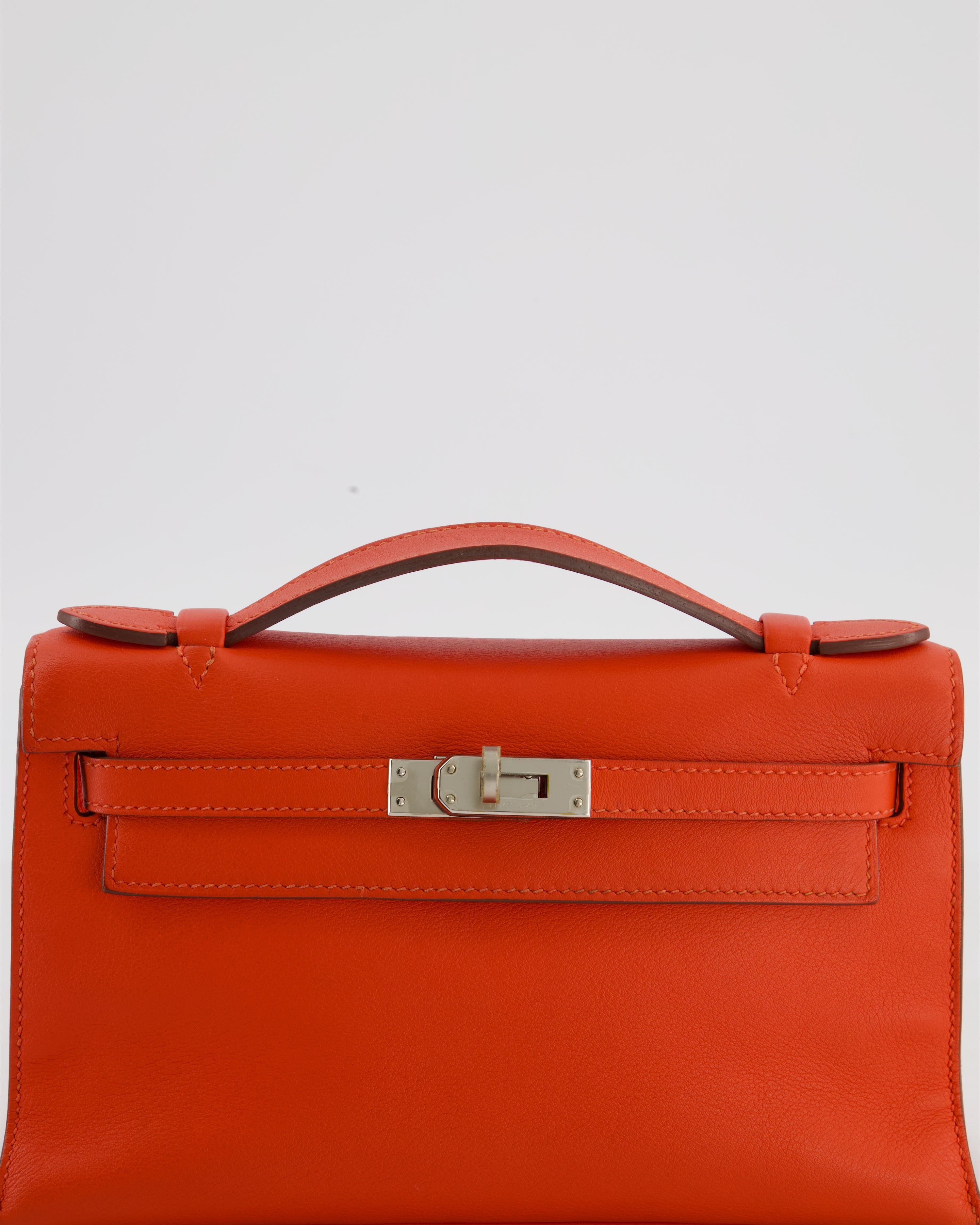 Hermès Kelly Pochette Bag in Capucine Swift Leather with Palladium Hardware