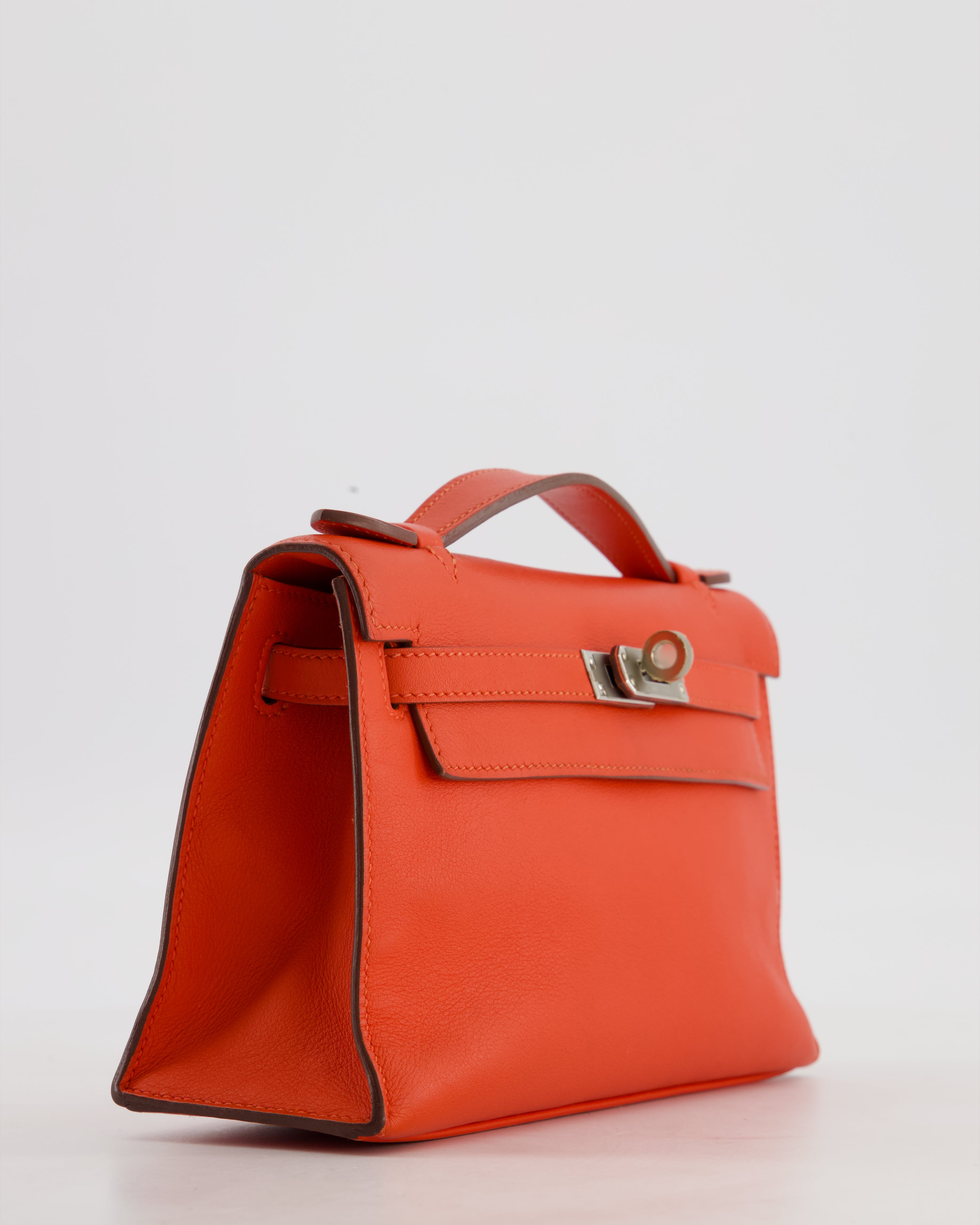 Hermès Kelly Pochette Bag in Capucine Swift Leather with Palladium Hardware