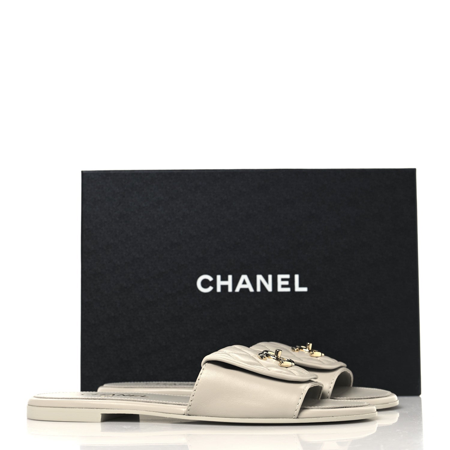Lambskin Quilted Turnlock Flat Mules 39 Light Grey