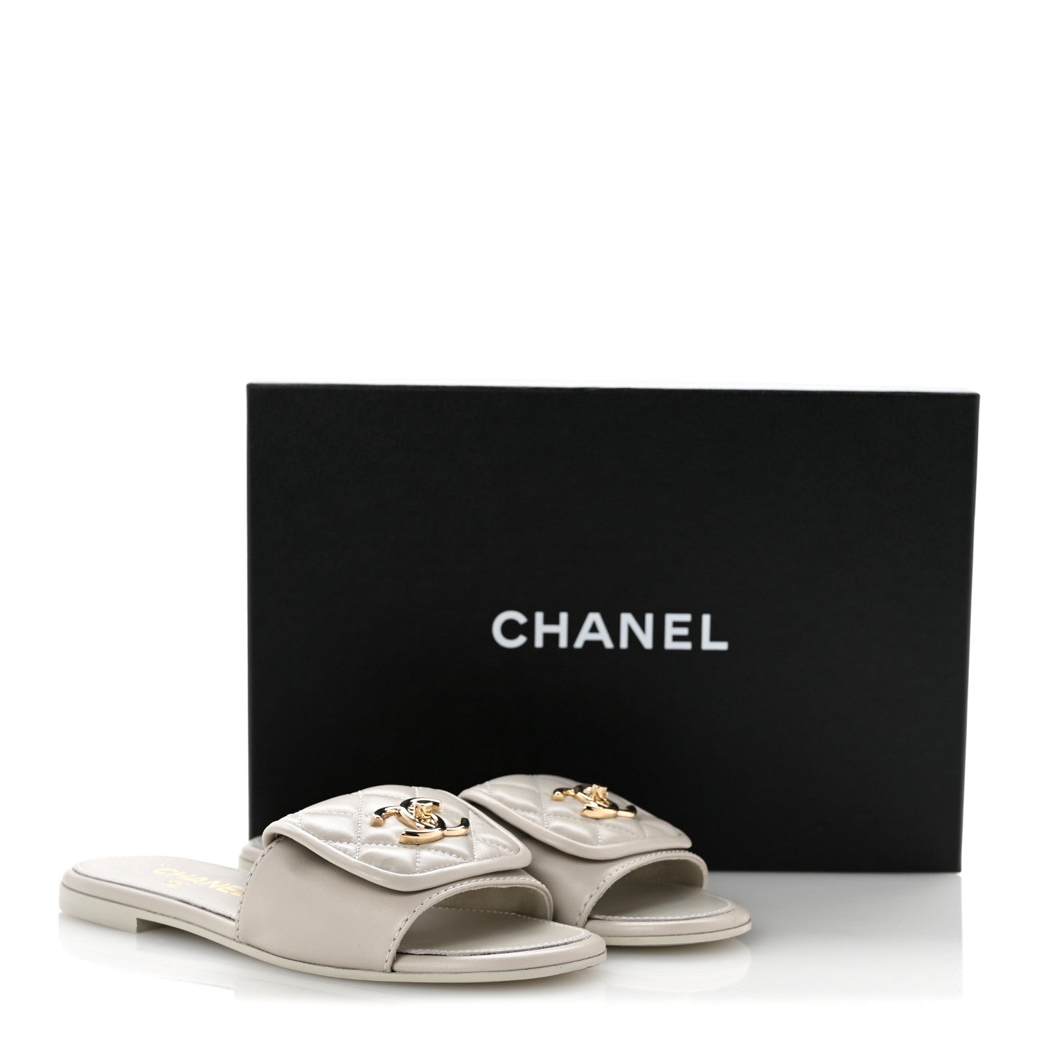 Lambskin Quilted Turnlock Flat Mules 35.5 Light Grey