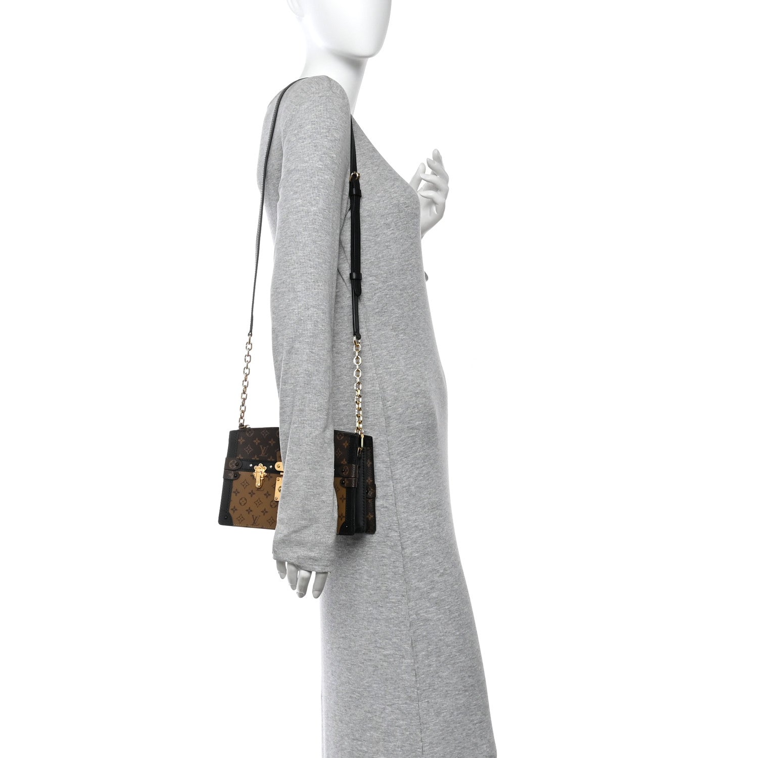 Reverse Monogram Trunk Clutch