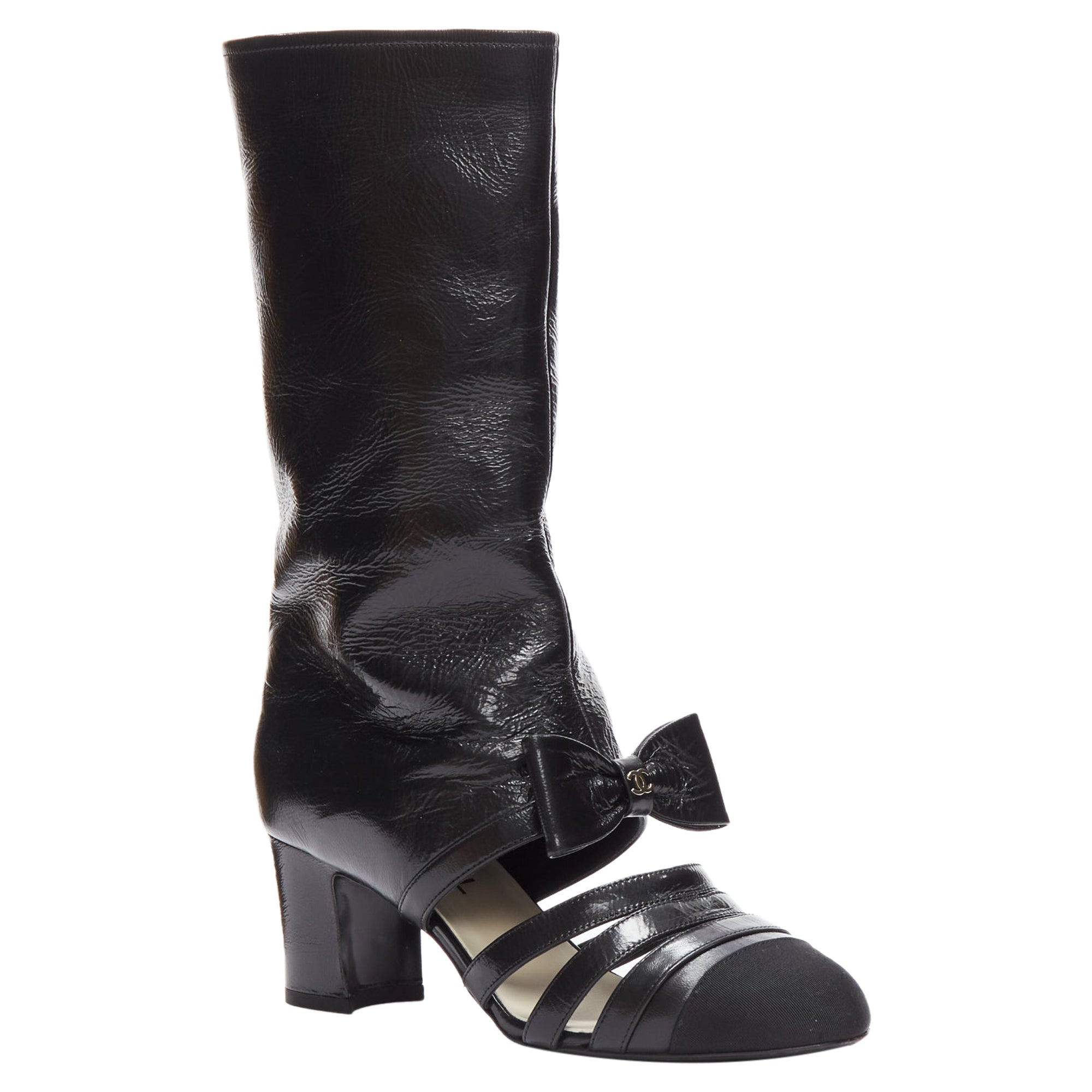 Women's Chanel silver CC bow leather cut out boots