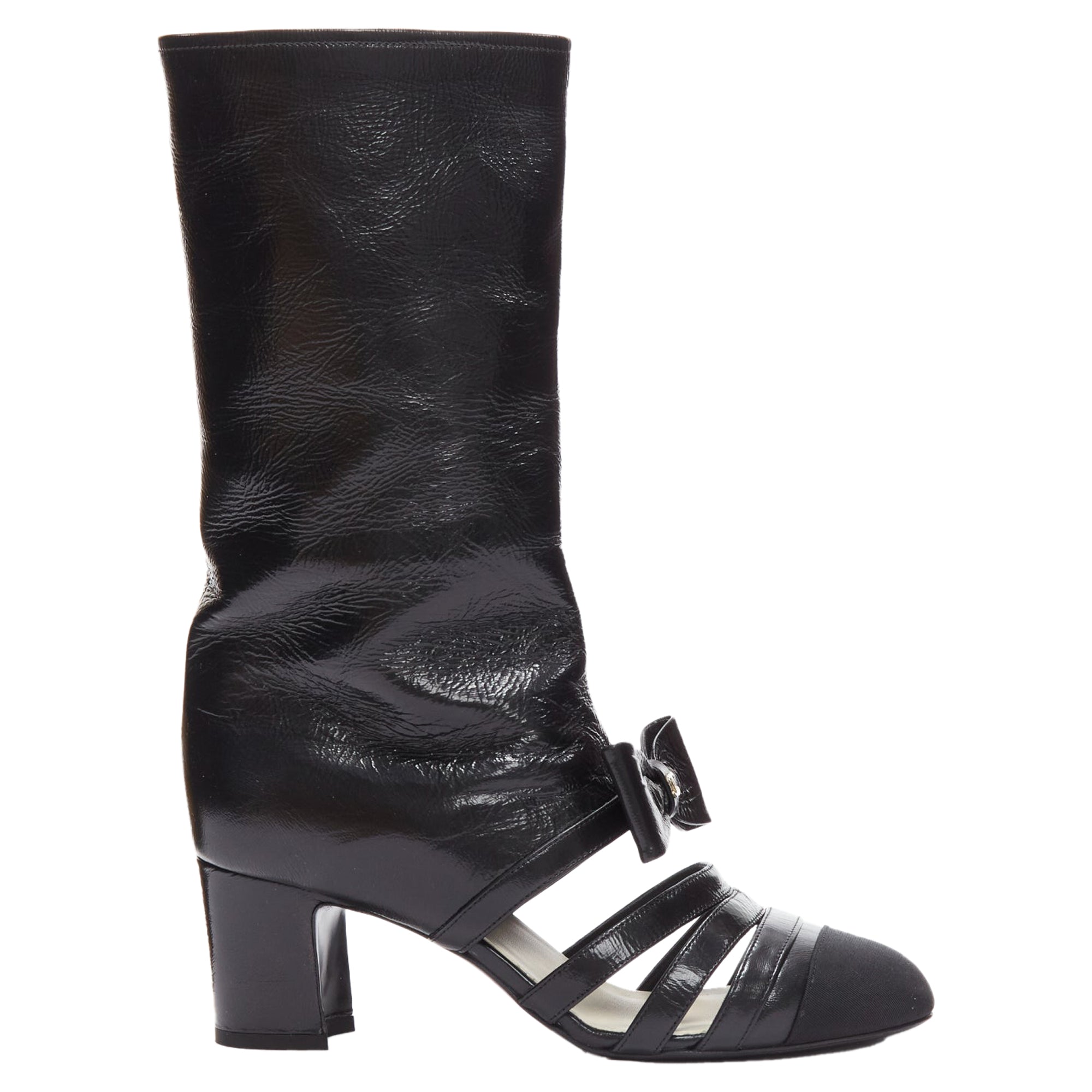 Women's Chanel silver CC bow leather cut out boots