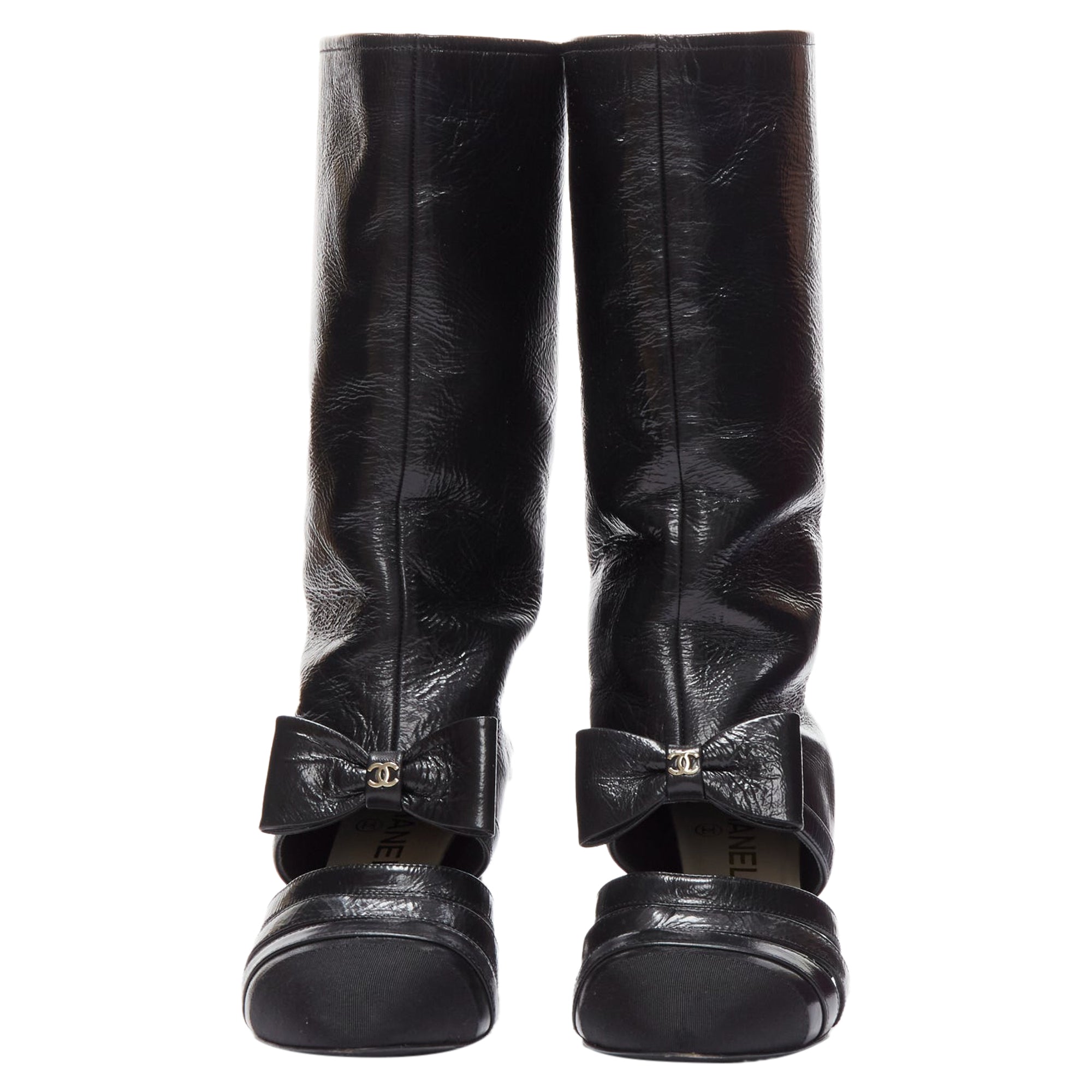 Women's Chanel silver CC bow leather cut out boots