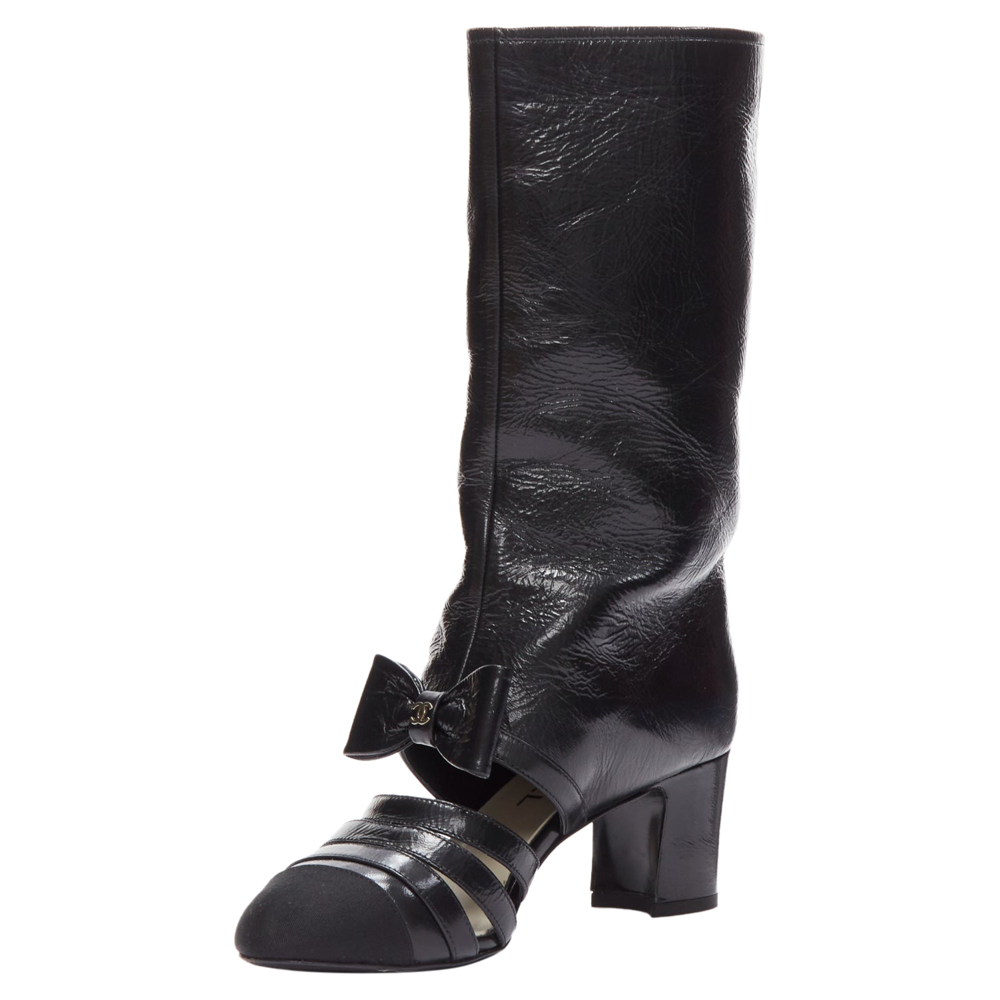 Women's Chanel silver CC bow leather cut out boots