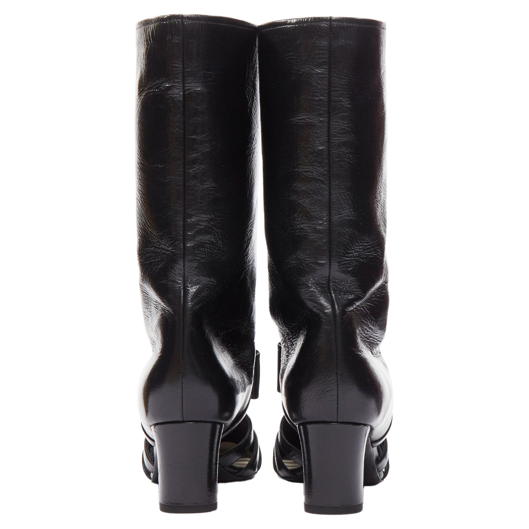 Women's Chanel silver CC bow leather cut out boots