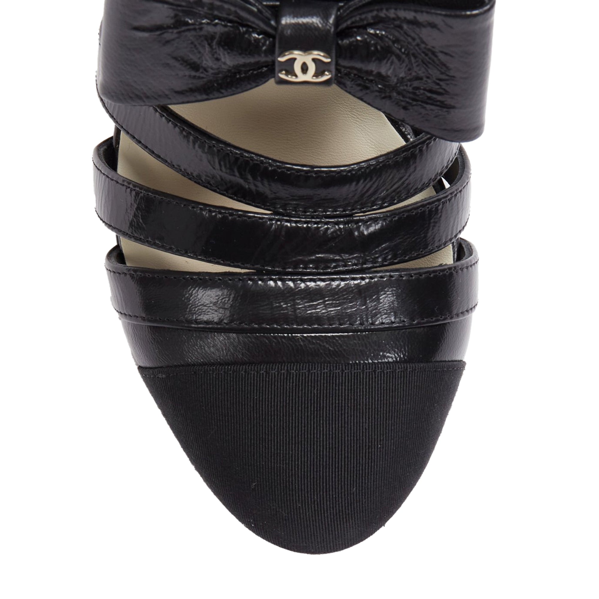 Women's Chanel silver CC bow leather cut out boots