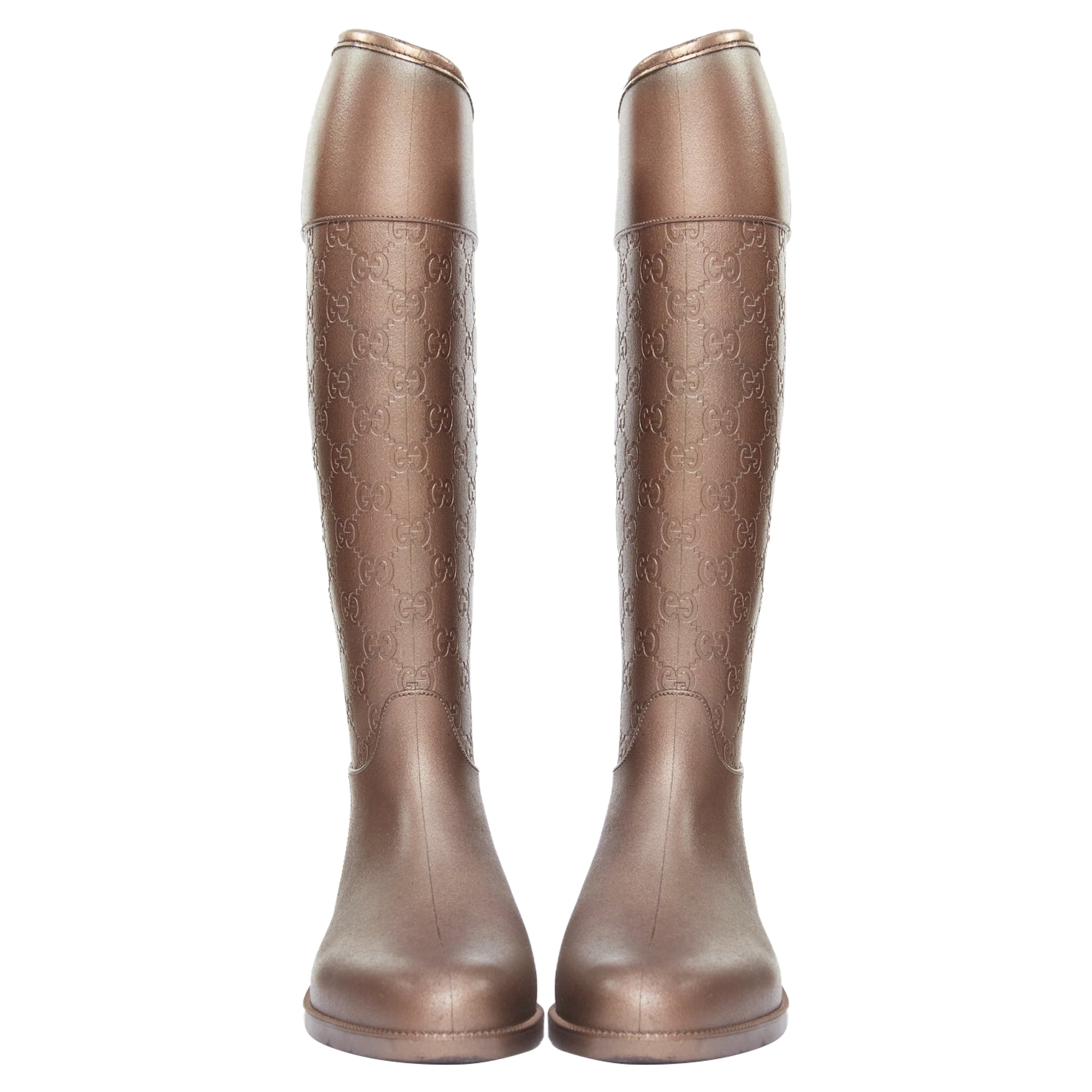 Women's Gucci bronze rubber rainboots