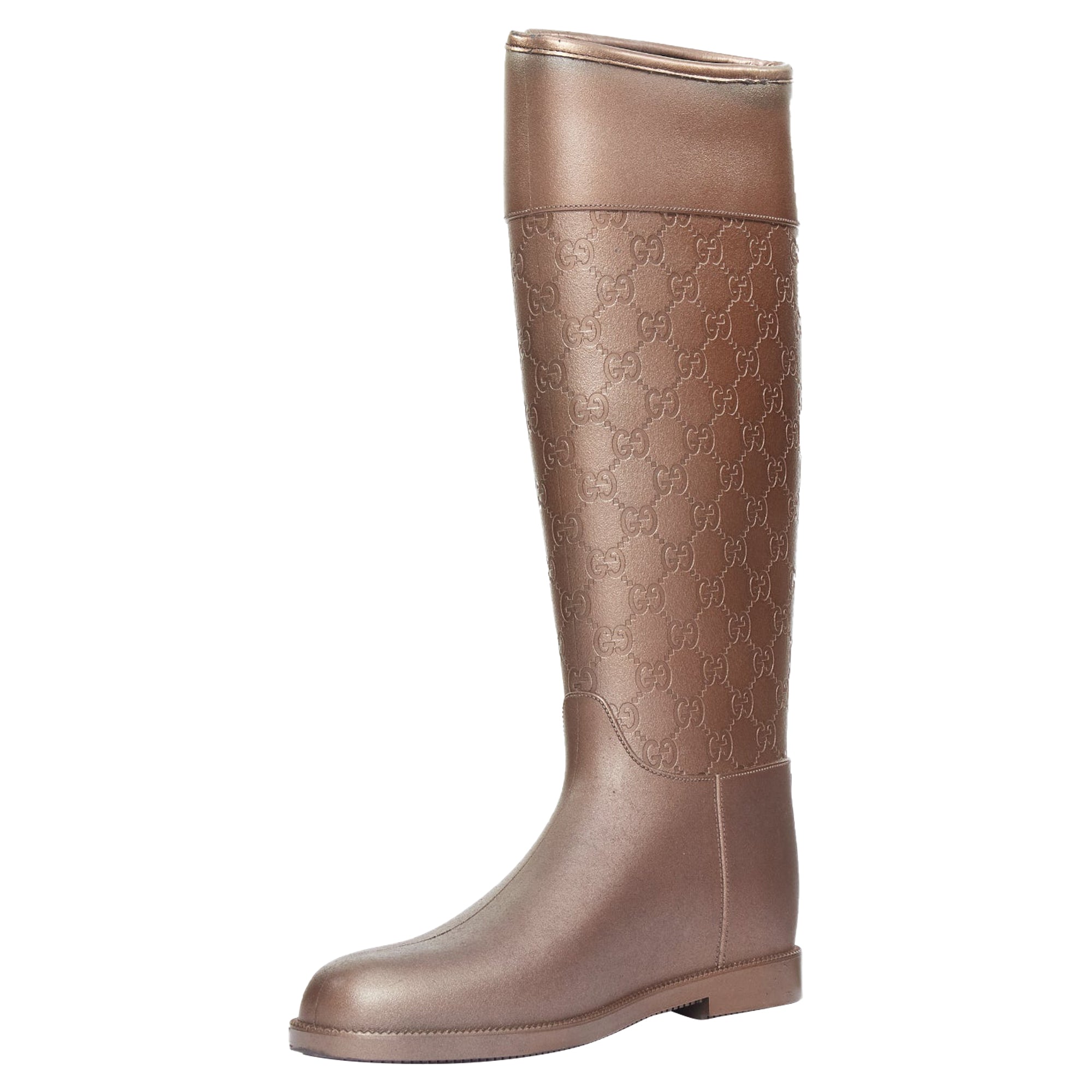 Women's Gucci bronze rubber rainboots