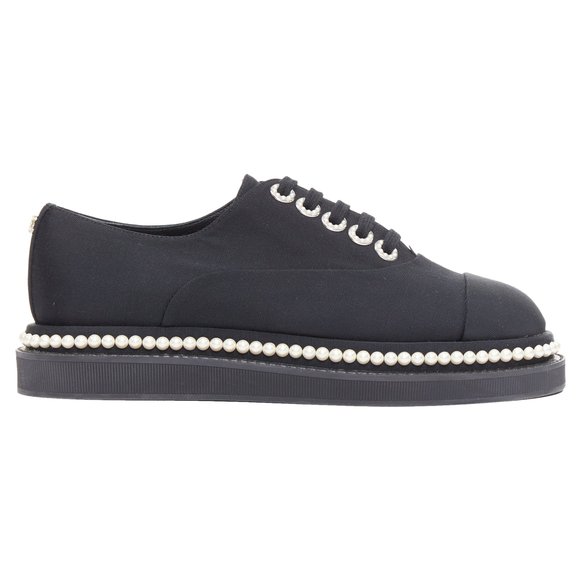 Women's Chanel black canvas pearl oxfords