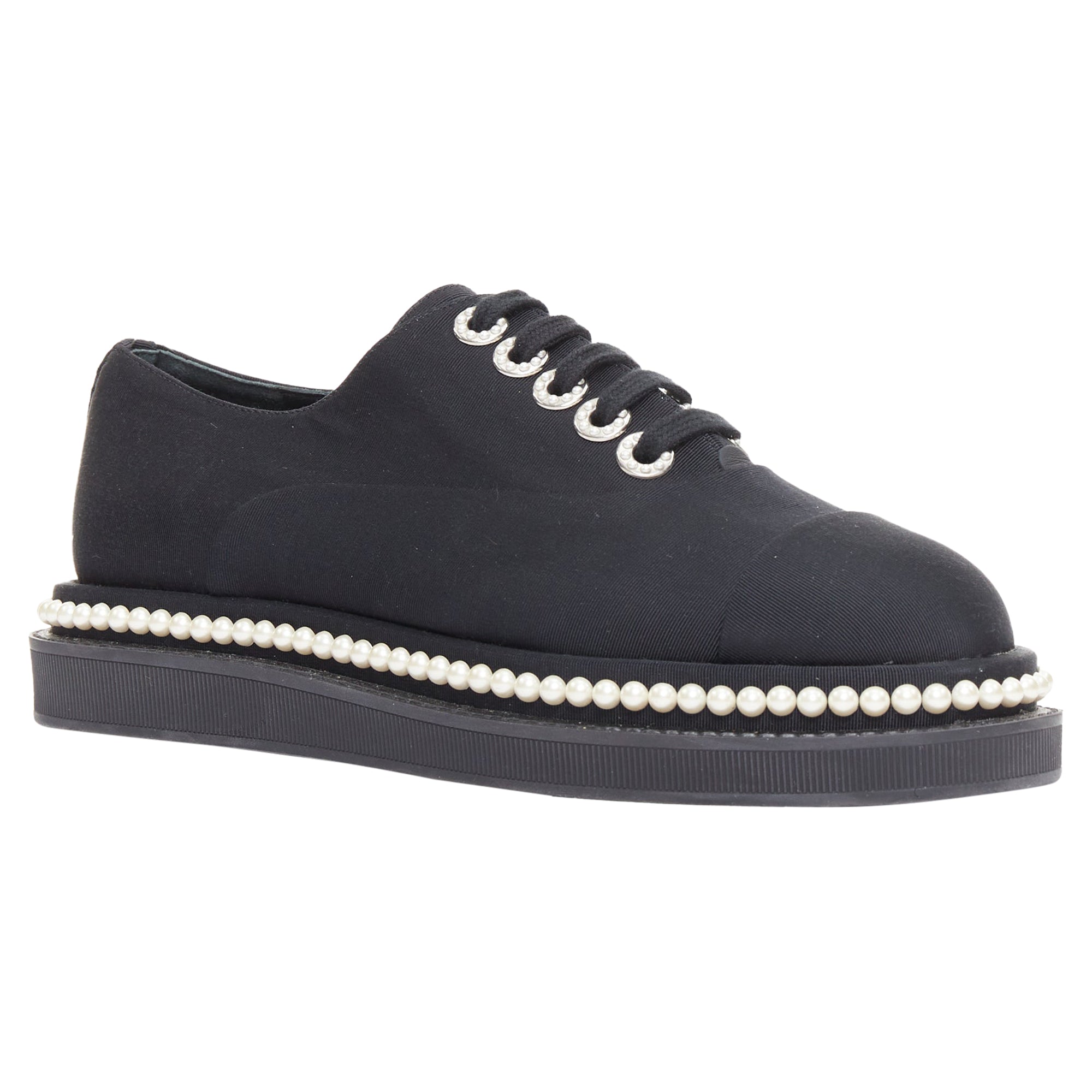 Women's Chanel black canvas pearl oxfords