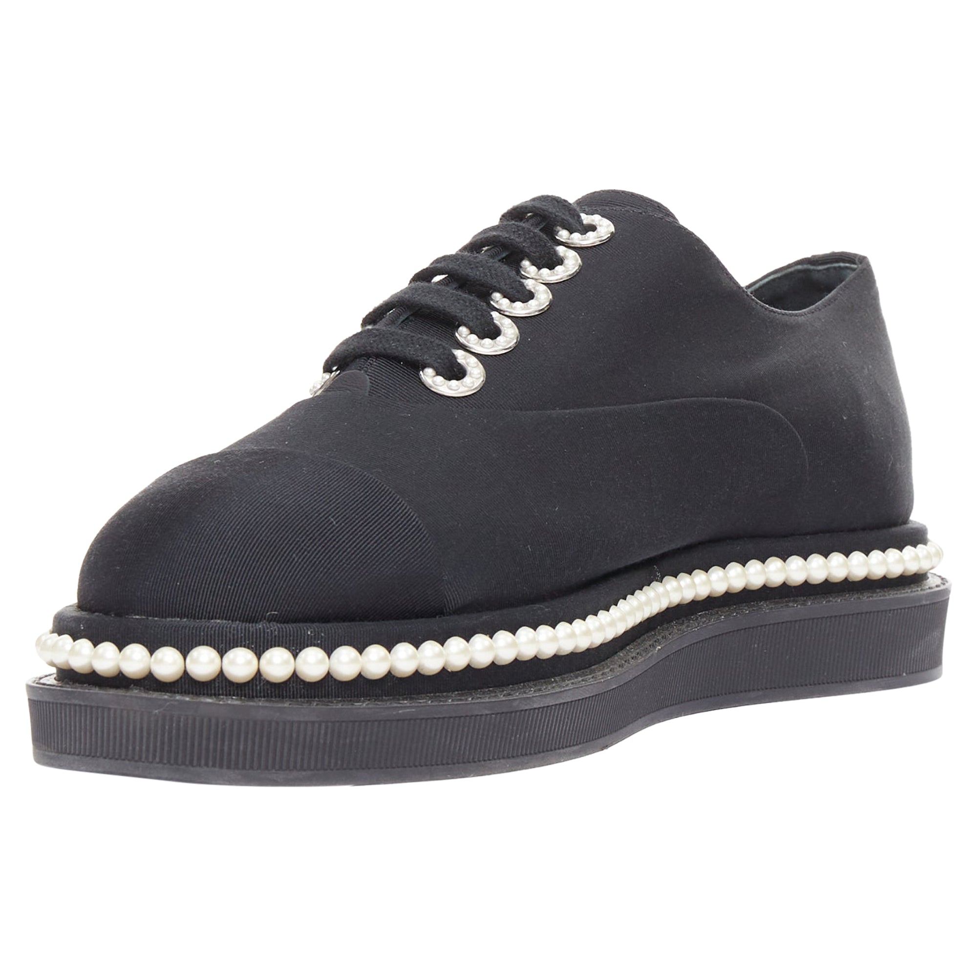 Women's Chanel black canvas pearl oxfords