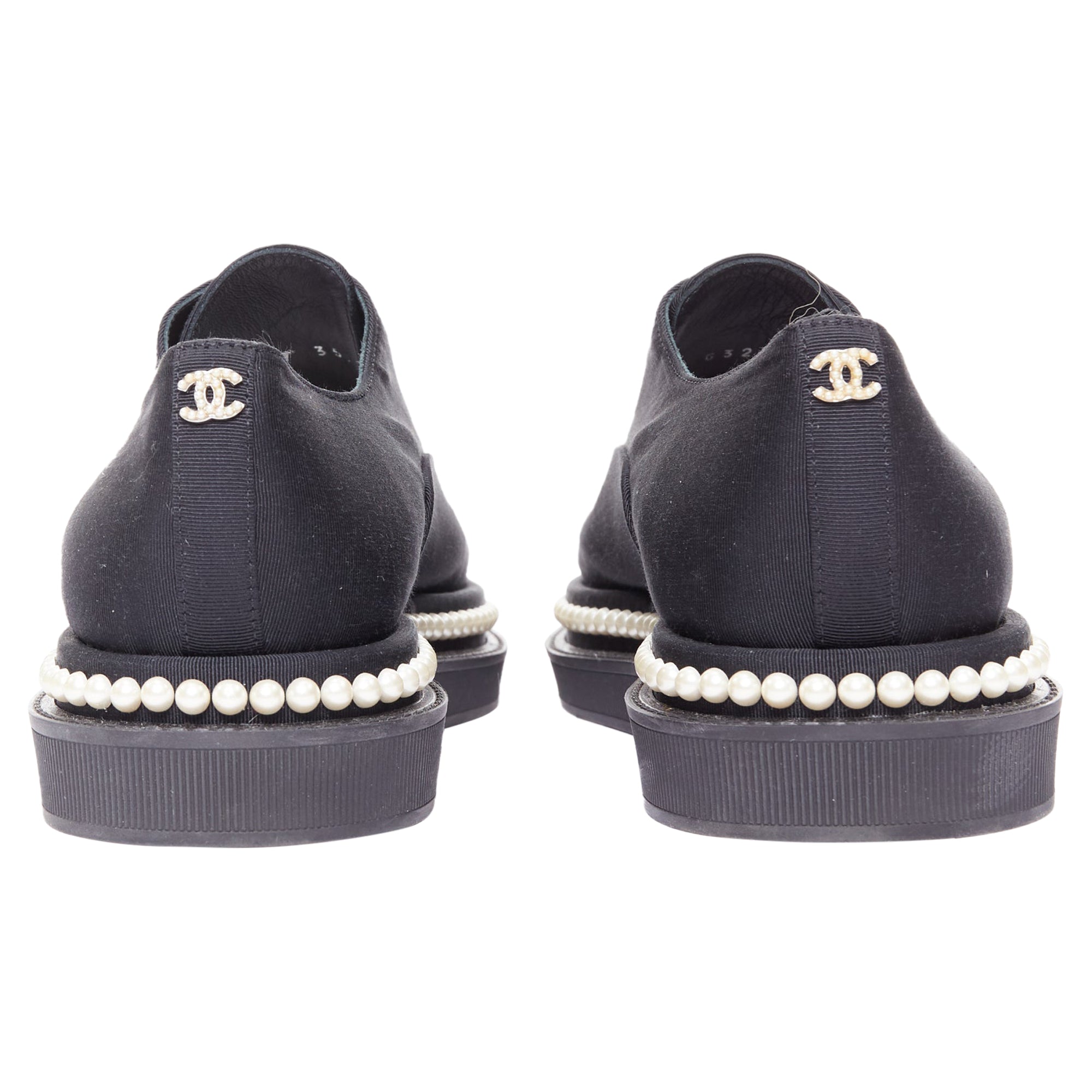 Women's Chanel black canvas pearl oxfords