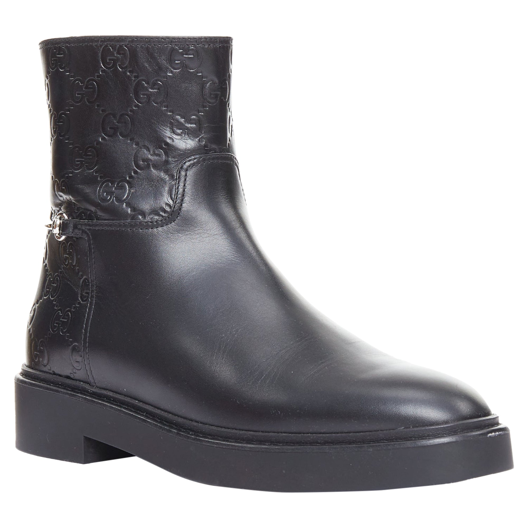Women's Gucci black monogram ankle boots