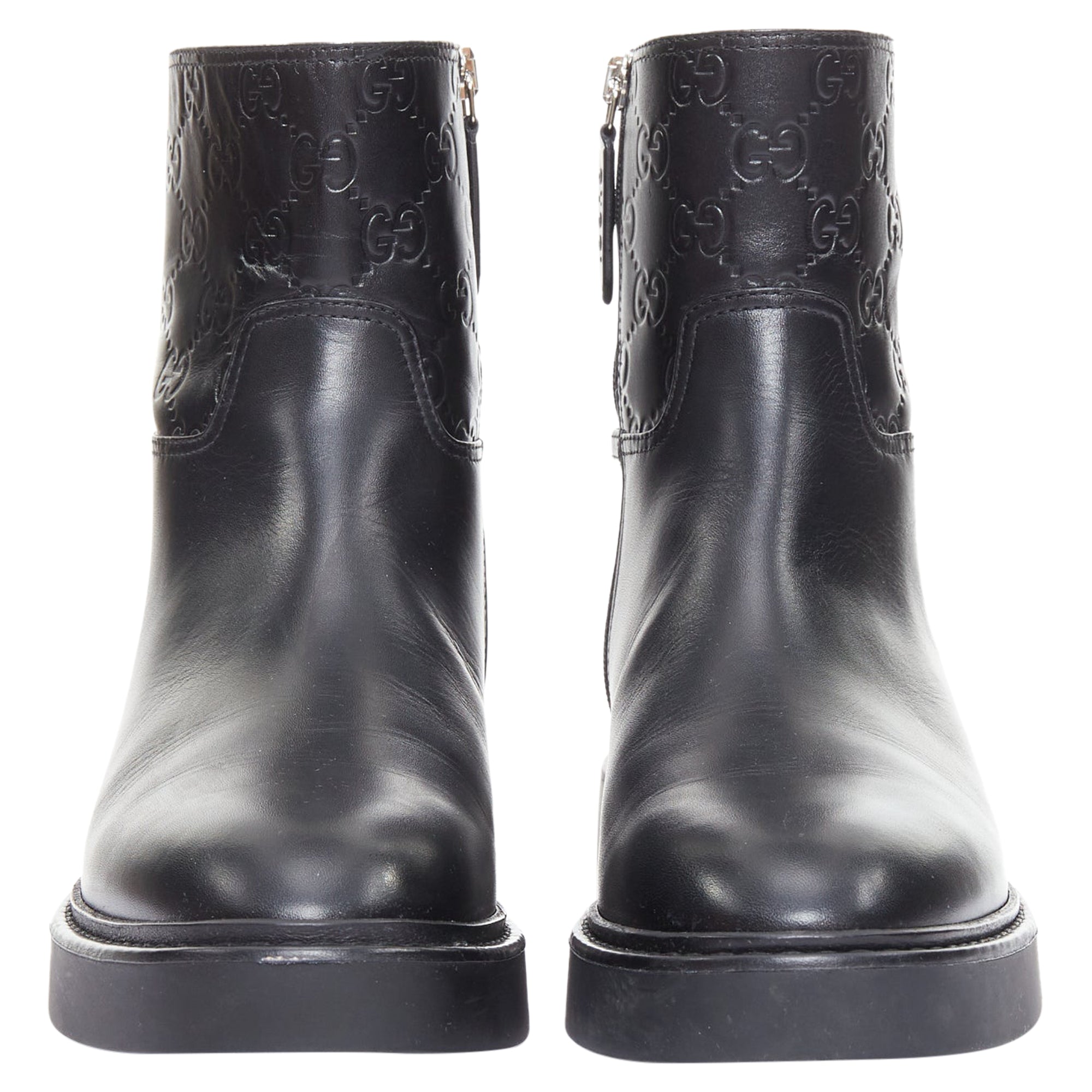 Women's Gucci black monogram ankle boots